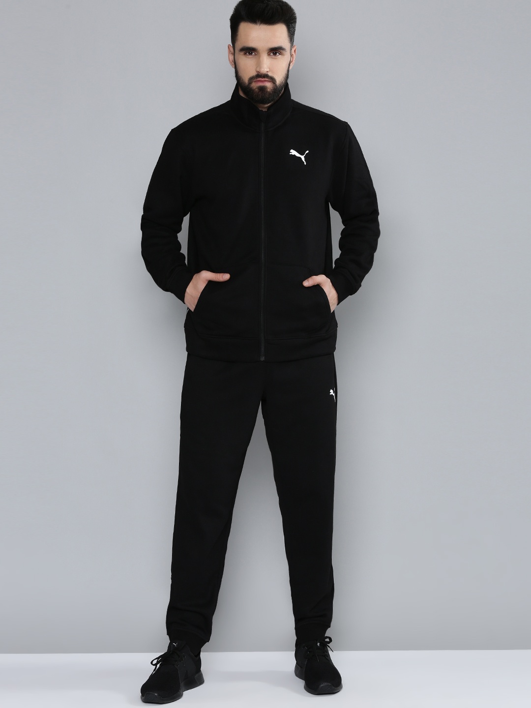 

Puma Men Black Slim Fit TRAIN FAV KNITTED Sustainable Tracksuit