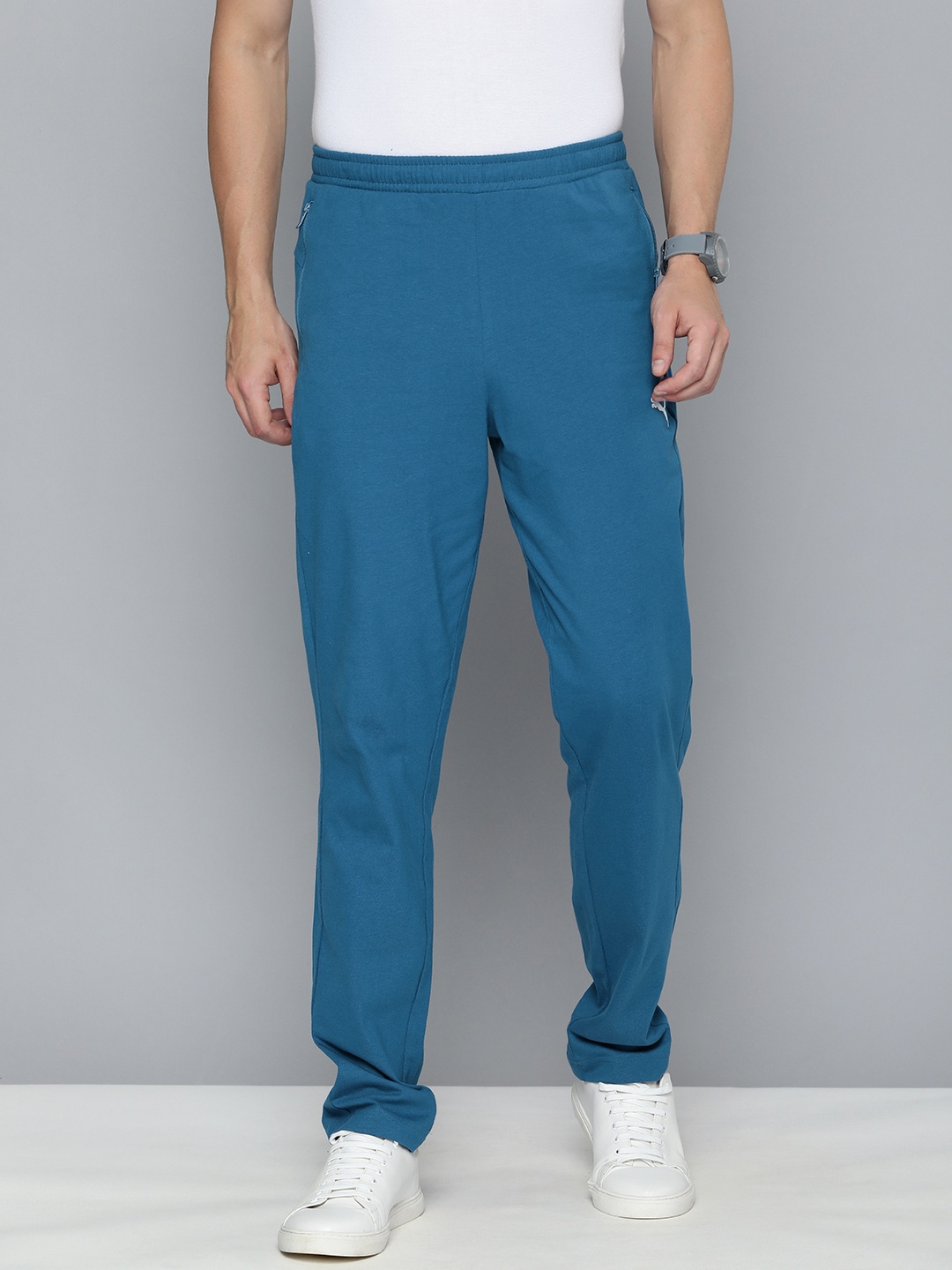 

Puma Men Blue Zippered Knitted Regular Fit Track Pants