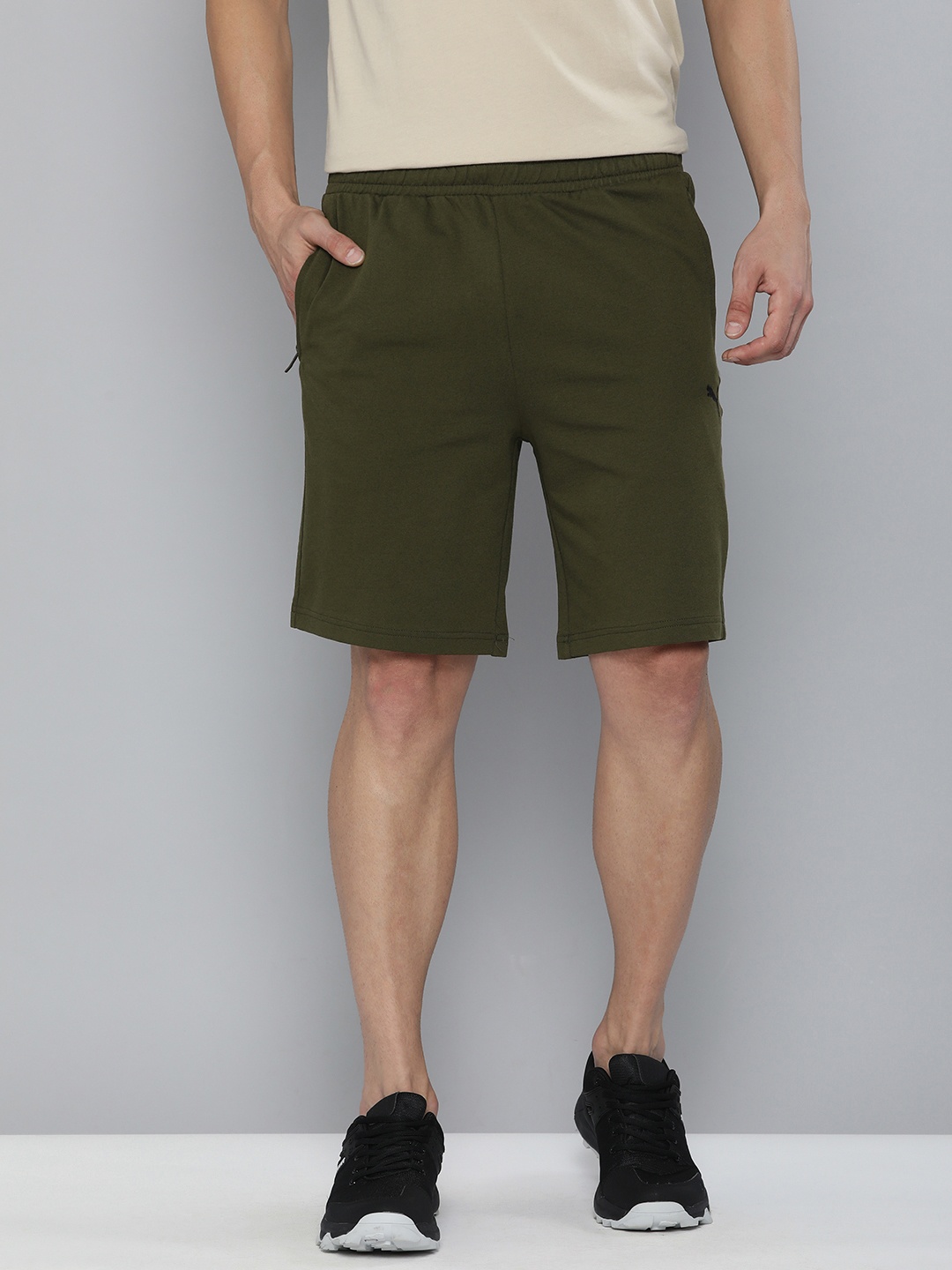 

Puma Men Olive Green Brand Logo Printed Slim Fit Sports Shorts