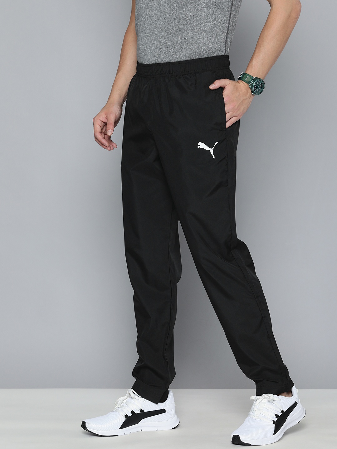 

PUMA Men Black Brand Logo Printed Regular fit Woven Track Pants