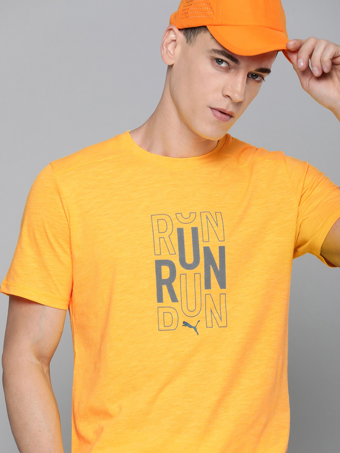 

Puma Men Typography Printed Dry-CELL Running T-shirt, Yellow