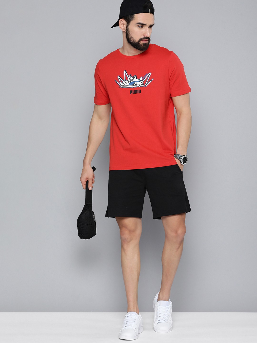 

Puma Men Red & Black Brand Logo Printed Pure Cotton T-shirt