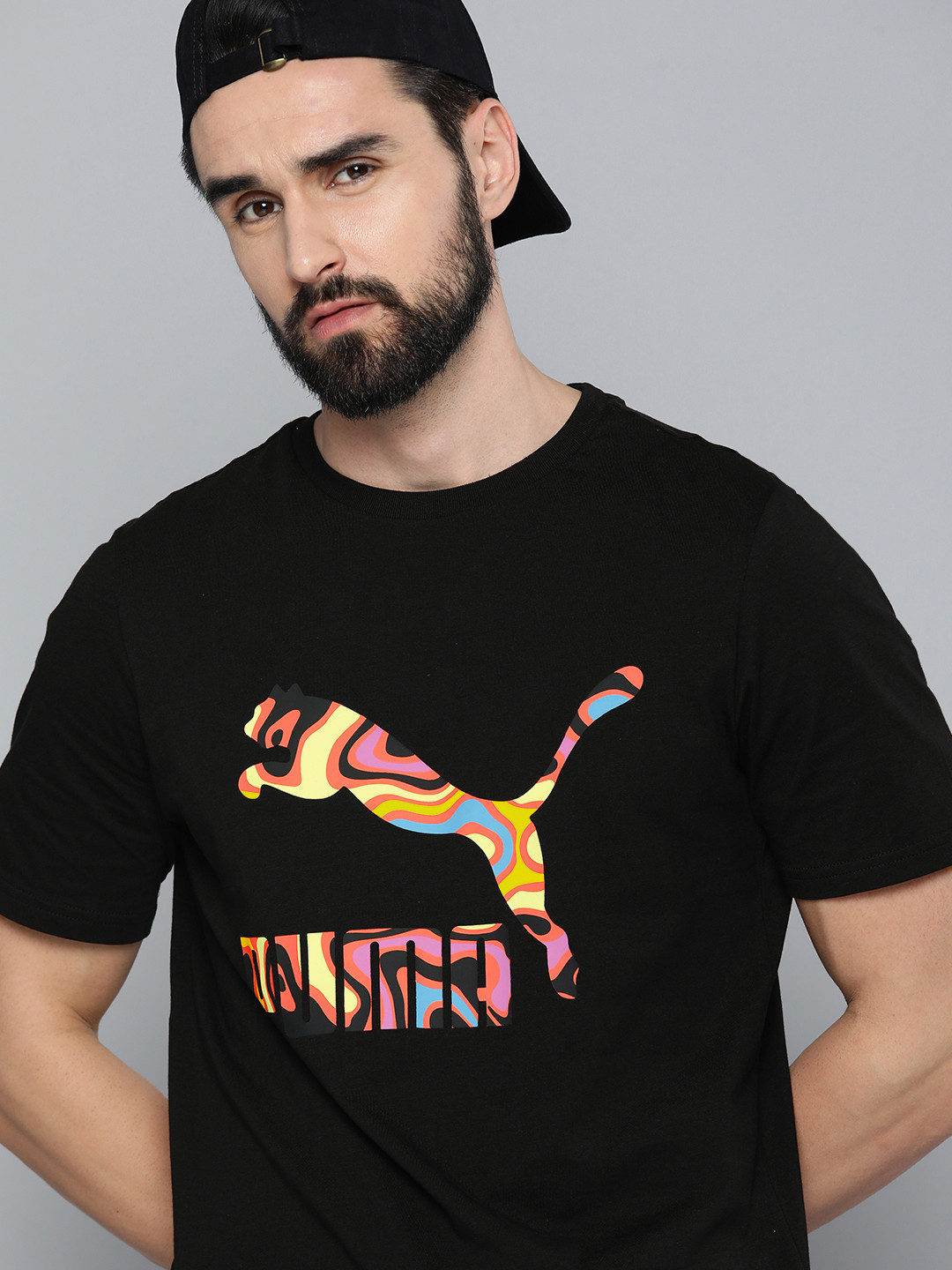 

Puma Men Black & Yellow Brand Logo Printed Pure Cotton T-shirt
