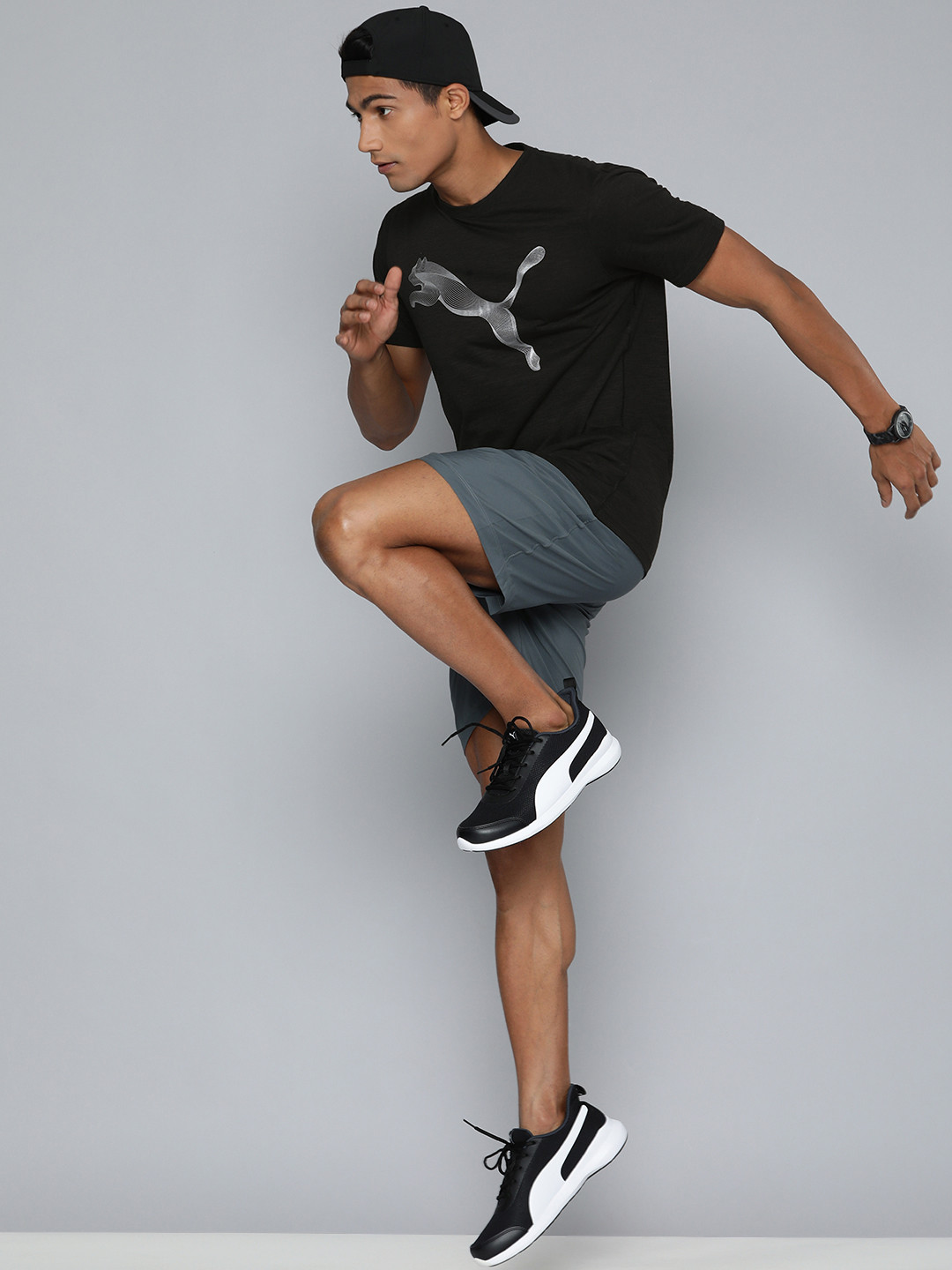 

Puma Men Black & Grey Brand Logo Printed T-shirt