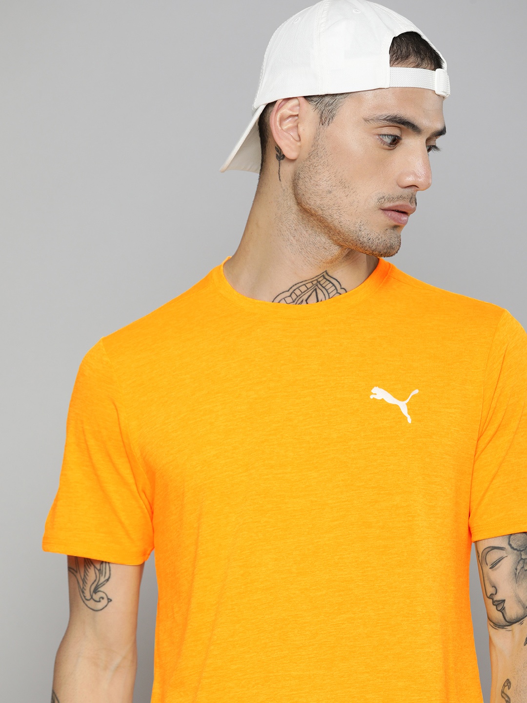 

Puma Men Solid Round Neck Favourite Heather Running Regular Fit T-shirt, Orange
