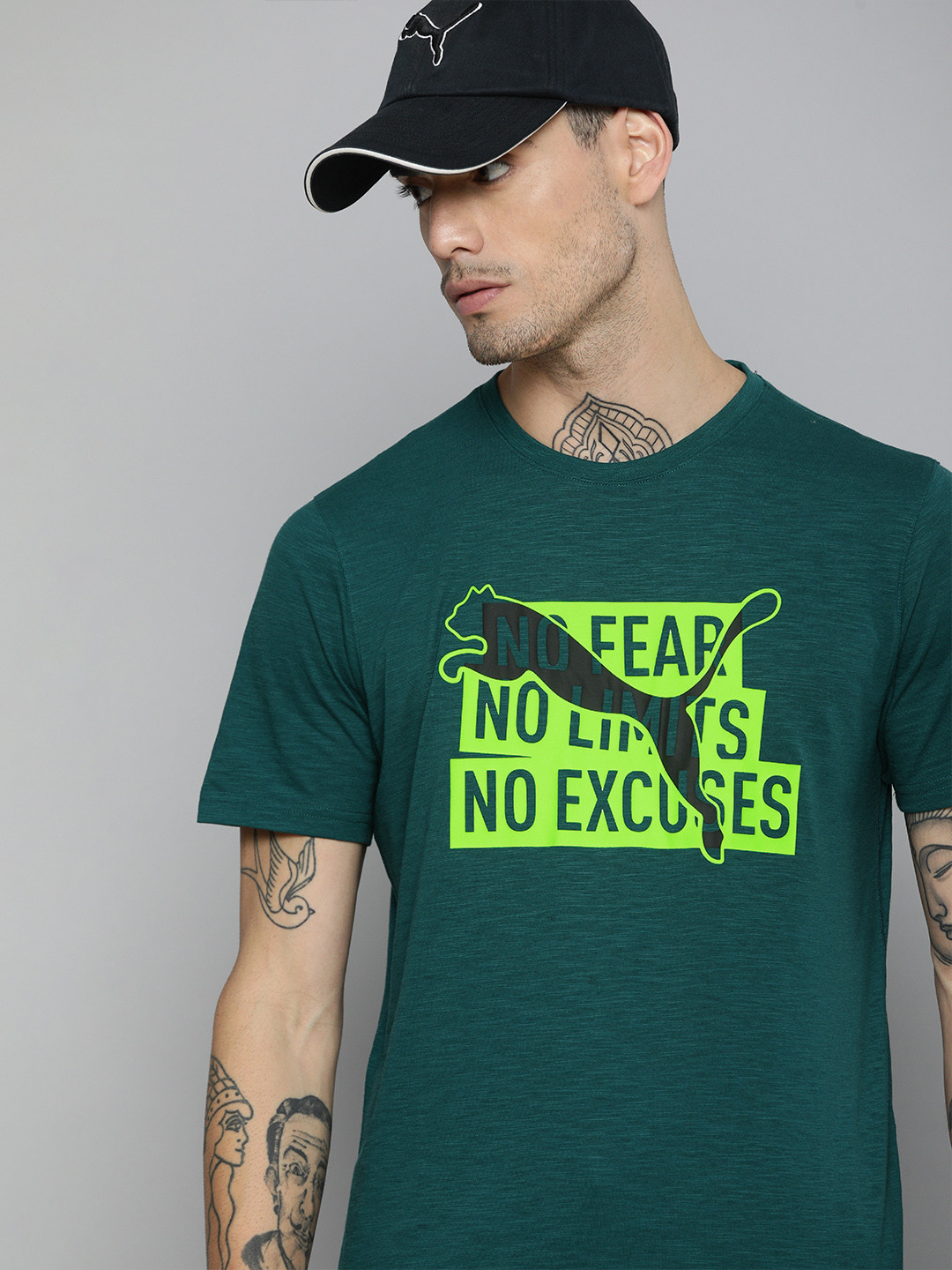 

Puma Men Brand Logo Print Round Neck Dry Cell PERFORMANCE SLOGAN CAT Regular Fit T-Shirt, Teal