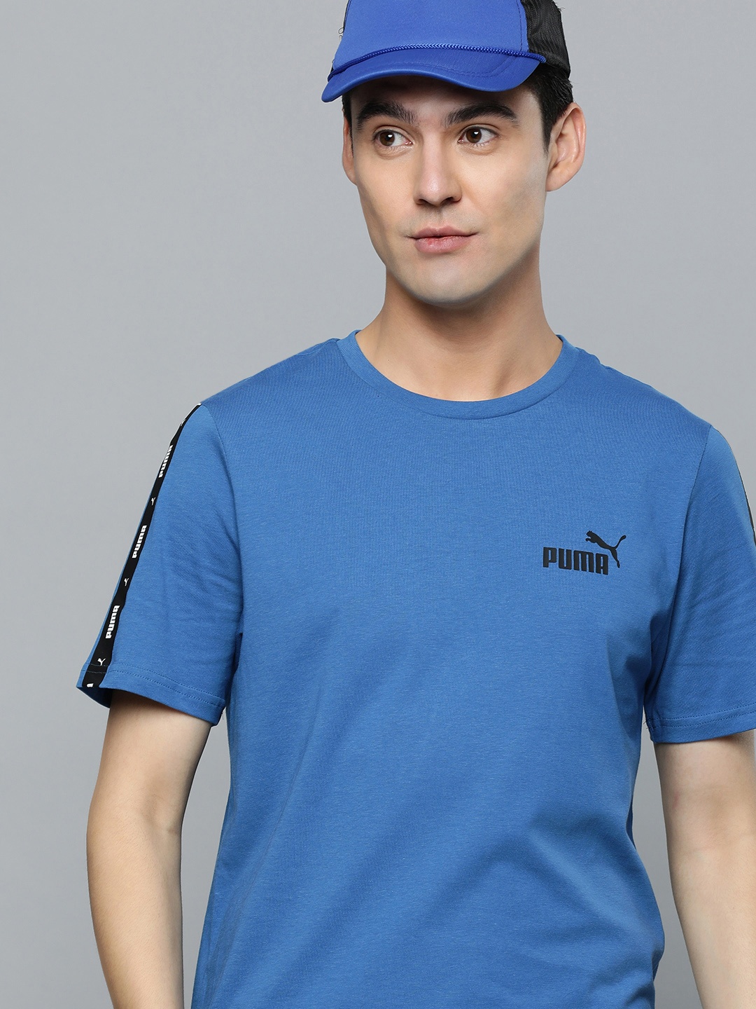 

Puma Men Blue Solid Round Neck Essentials+ Tape Pure Cotton Regular Fit T-shirt