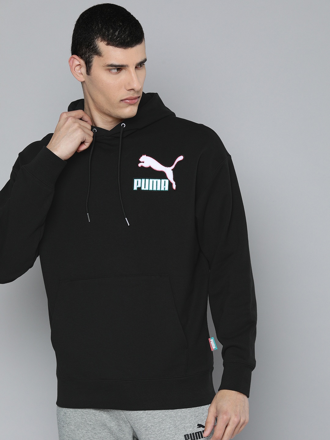 

Puma Men Solid Fandom Relaxed Fit Hoodie Sweatshirt, Black