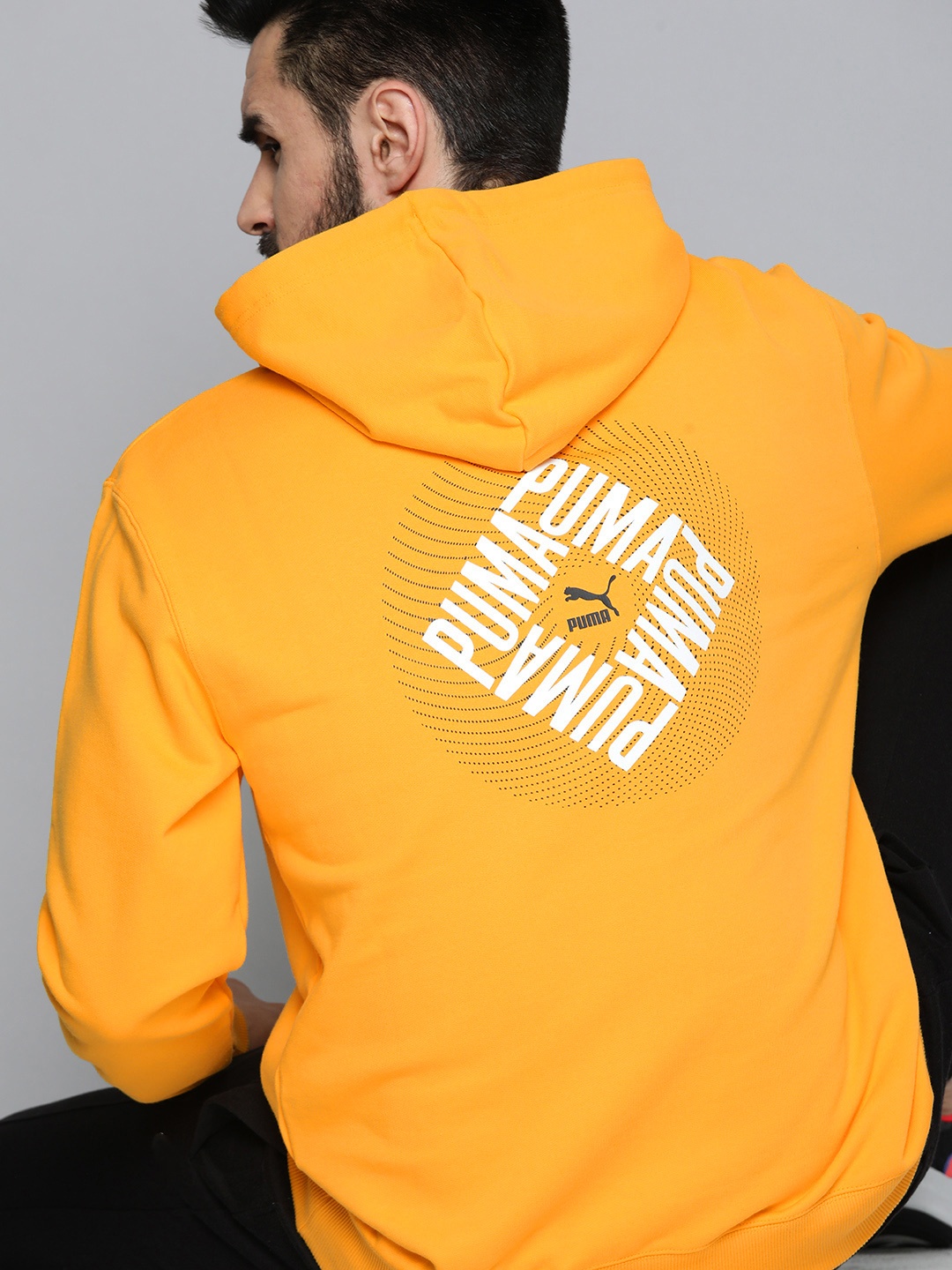 

Puma Men Regular Fit Graphic Printed Hooded Sweatshirt, Mustard