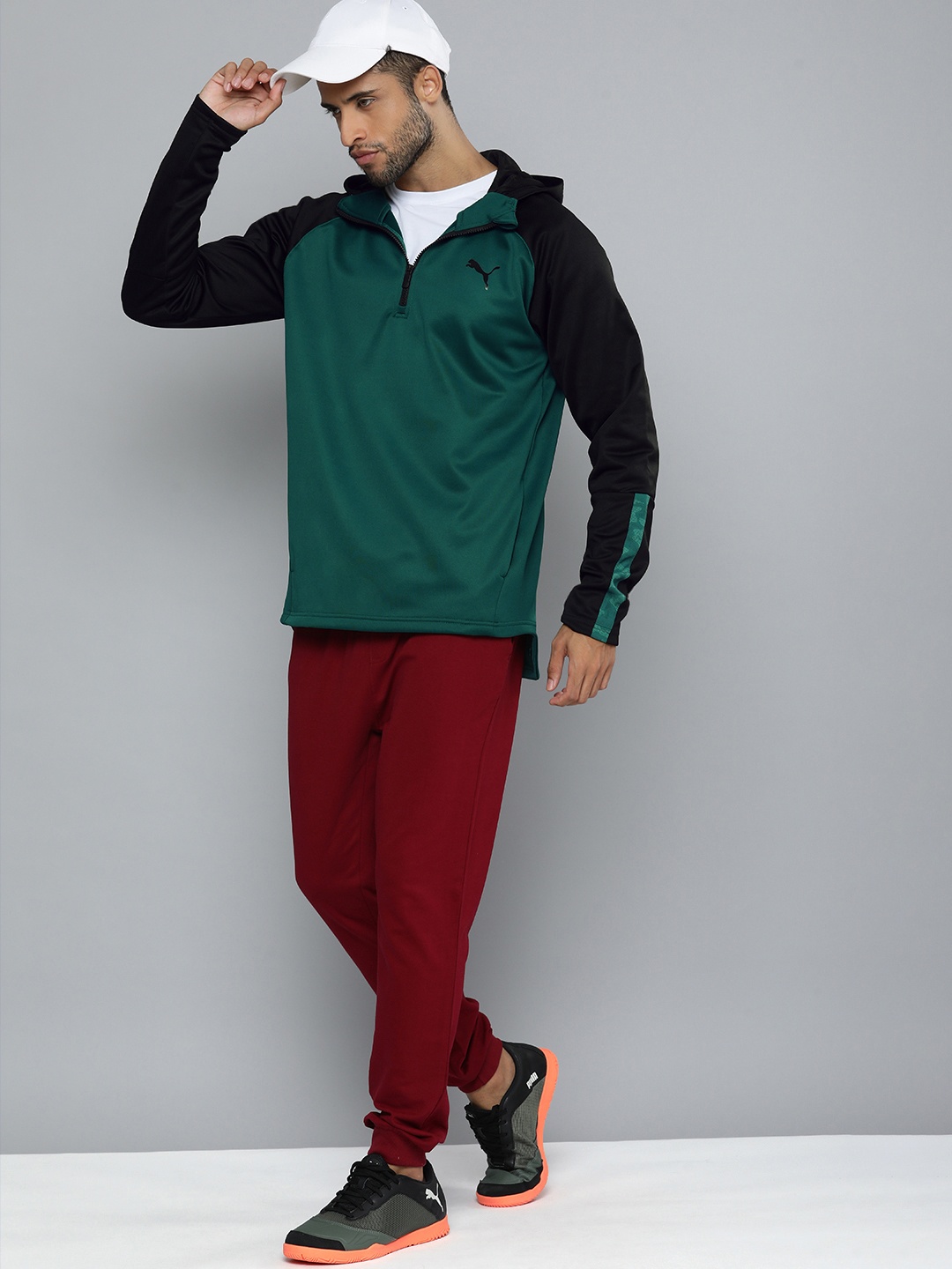 

Puma Men Teal Green Solid WarnCELL Hooded Training Off Season Sweatshirt