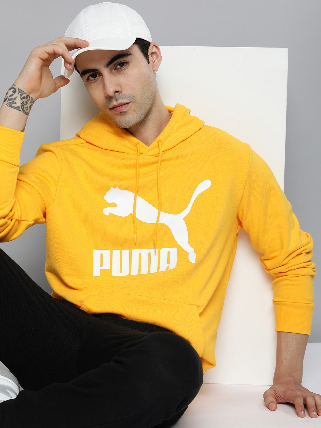 

Puma Men Yellow Printed Classics Logo Regular Fit Hooded Sweatshirt