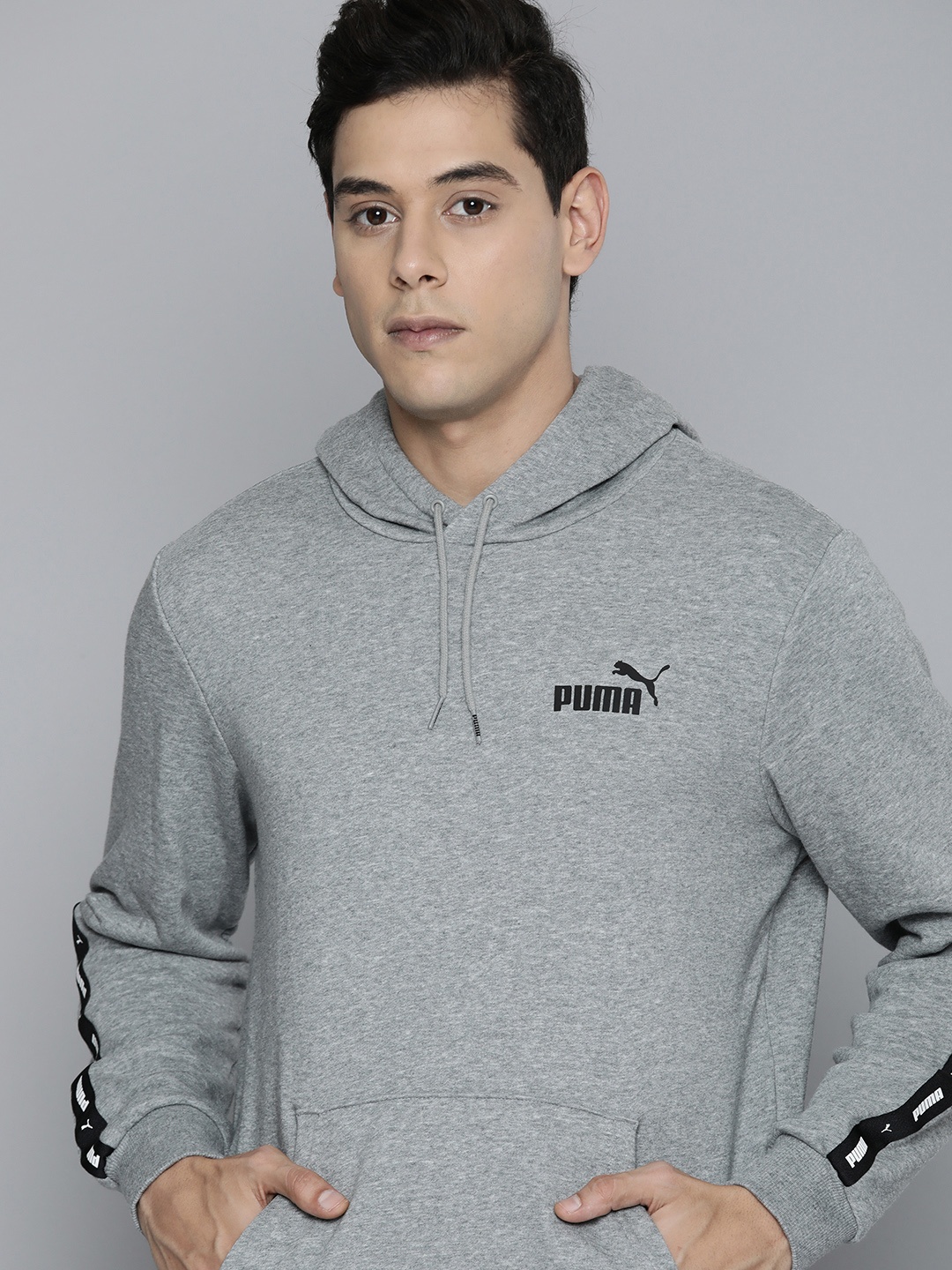 

Puma Men Regular Fit Solid Essential+ Tape Hooded Sweatshirt, Grey melange