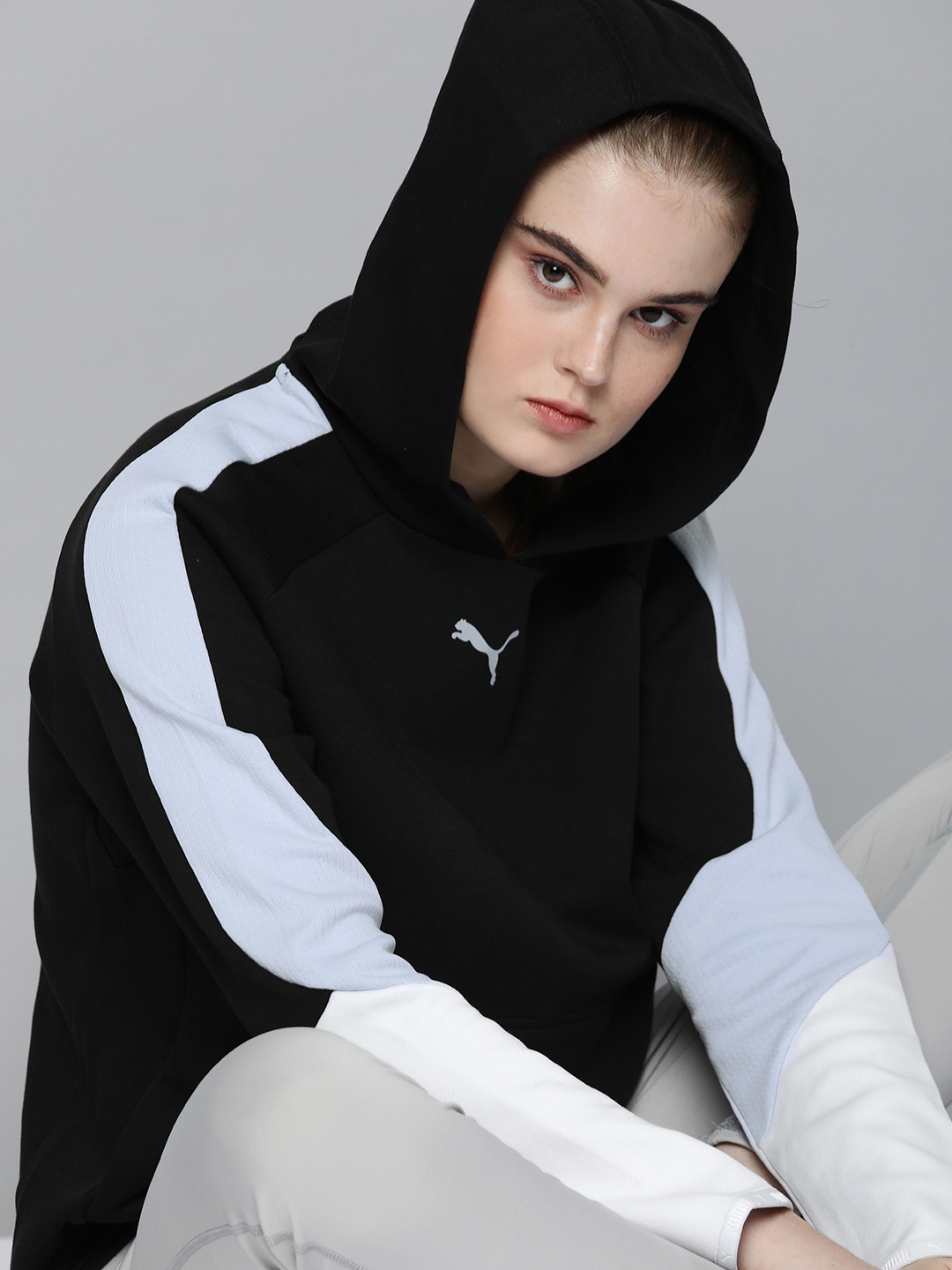 

Puma Women Relaxed Fit DryCELL Relaxed Fit Evostripe Hoodie Sweatshirt, Black