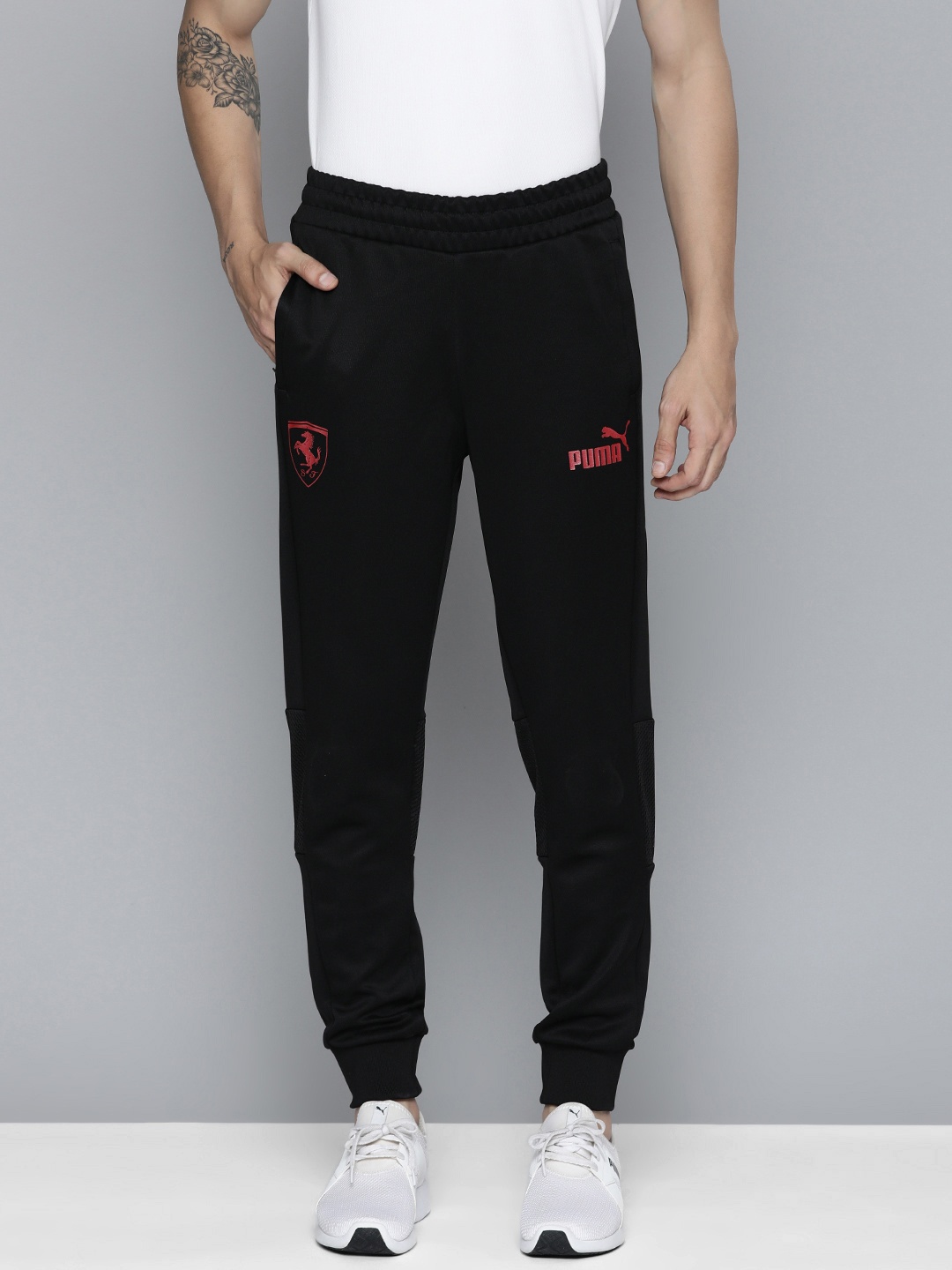 

PUMA Motorsport Men Solid Ferrari Race Metal Regular Fit Joggers, Black