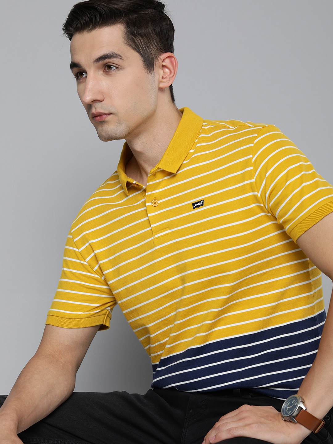 

Levis Men Yellow & Navy Blue Striped Polo Collar Pure Cotton T-shirt