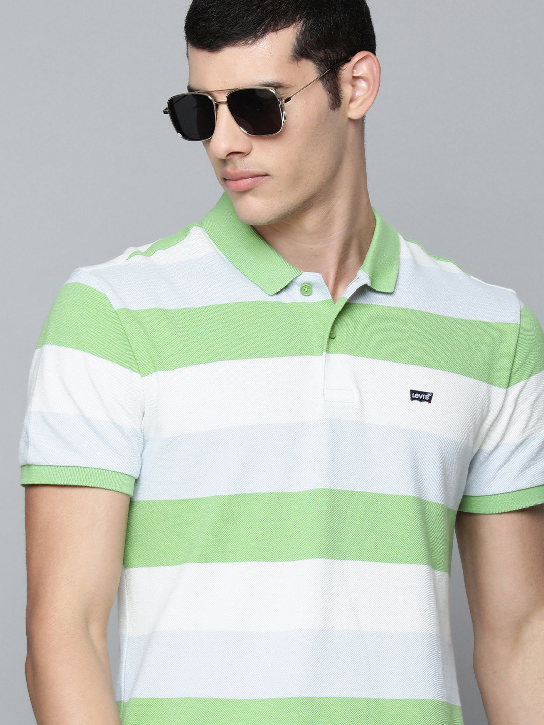 

Levis Men Green & White Striped Polo Collar Pure Cotton T-shirt
