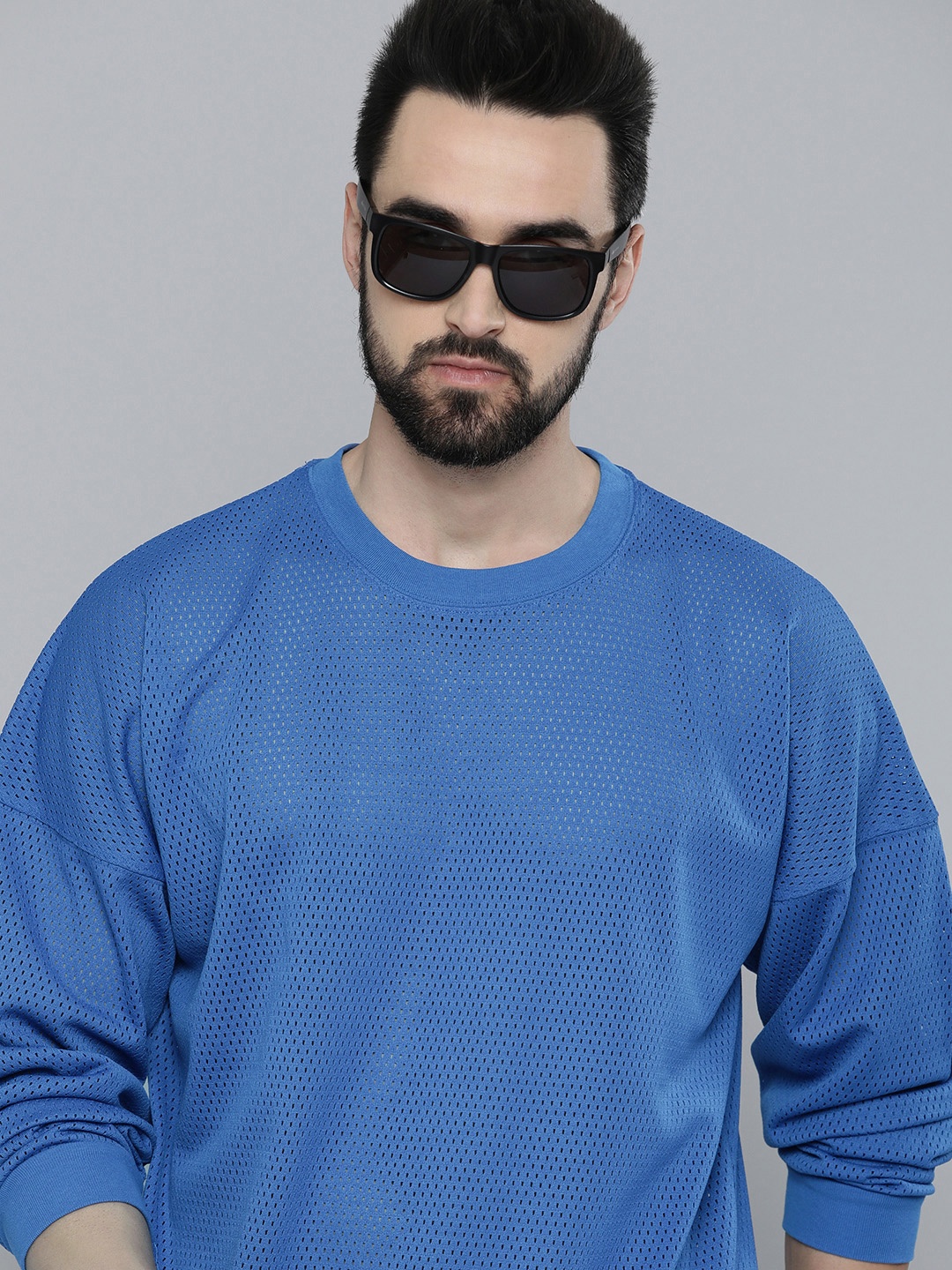 

Levis Men Blue Self Design Round Neck Extended Sleeves Cut Outs Indigo Relaxed Fit T-shirt