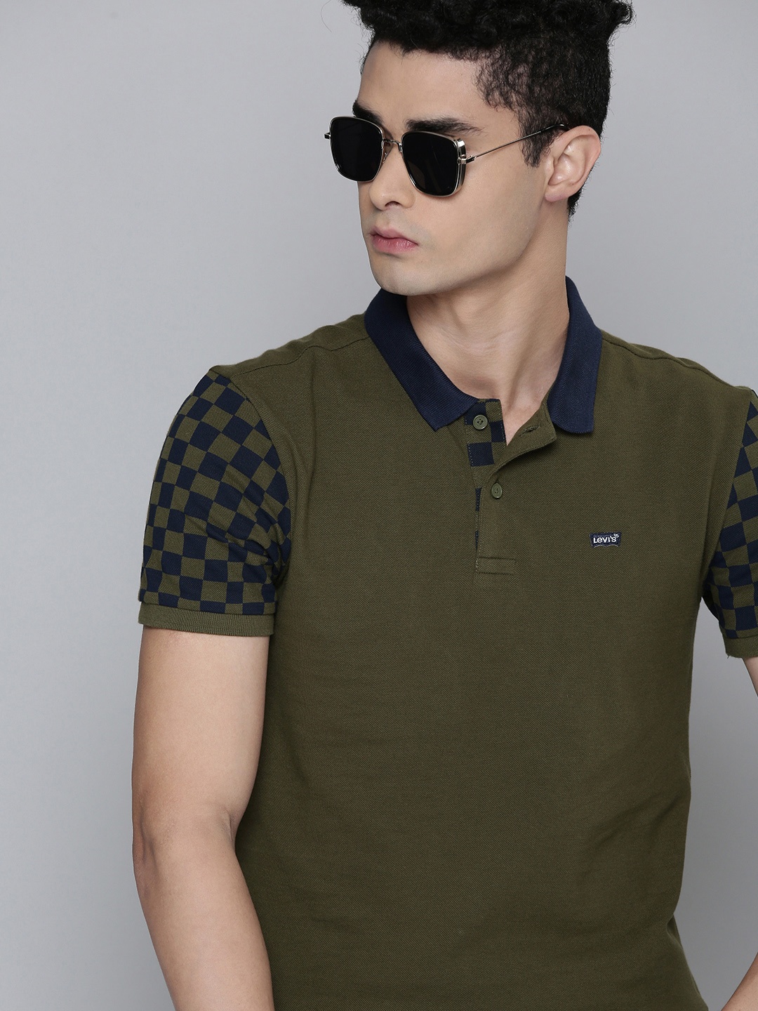

Levis Men Olive Green & Navy Blue Solid Contrast Polo Collar Pure Cotton T-shirt