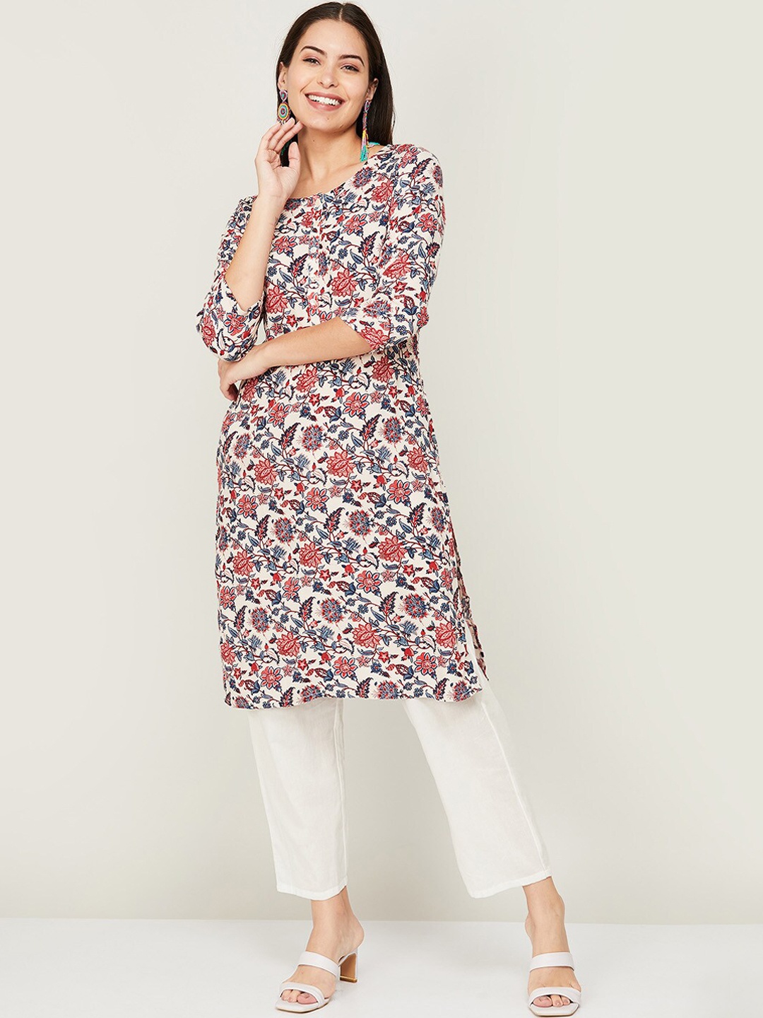 

Melange by Lifestyle Women White & Peach Floral Printed Round Neck Kurta