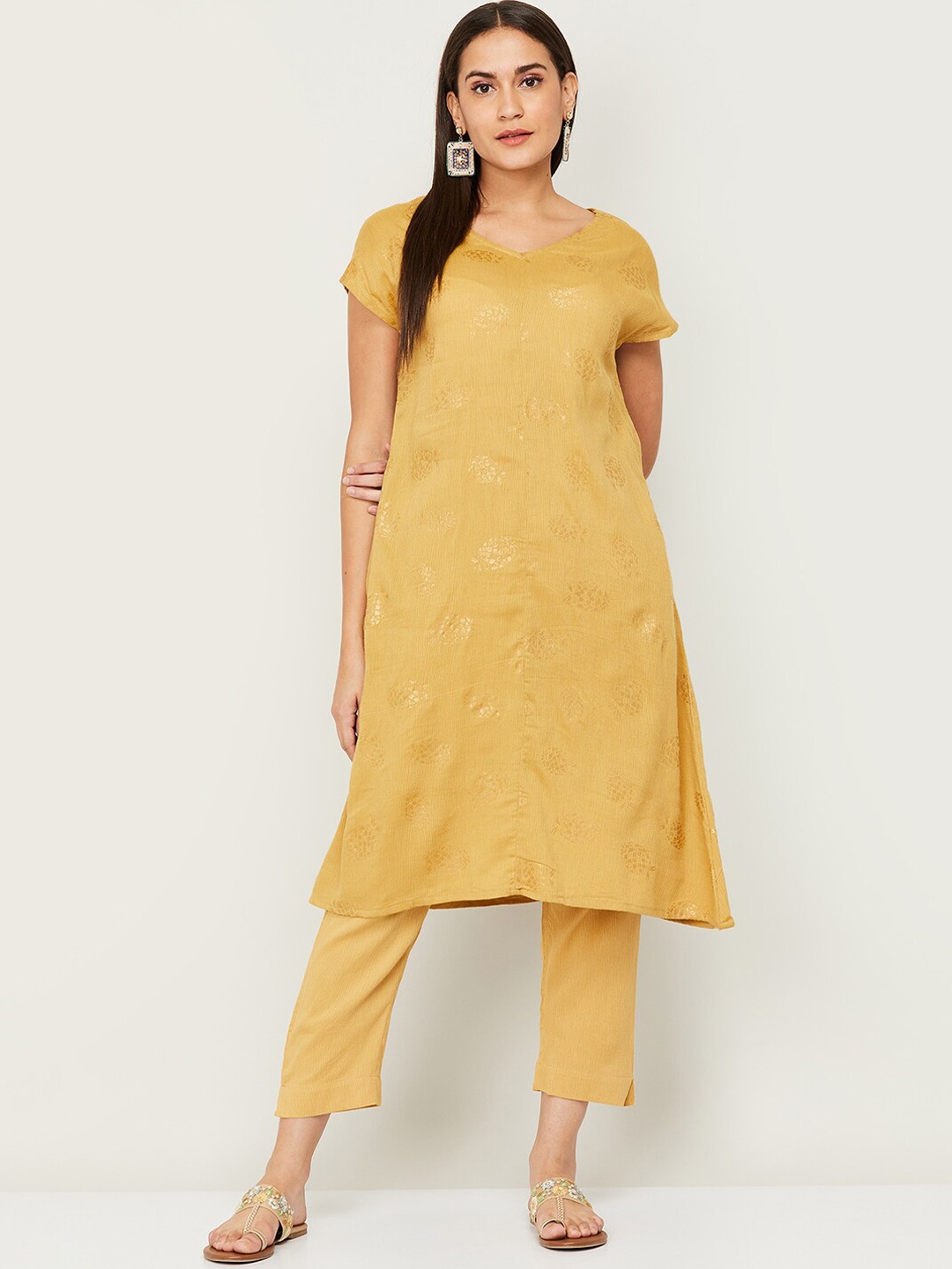 

Colour Me by Melange Women Yellow Ethnic Motifs Kurti with Trousers