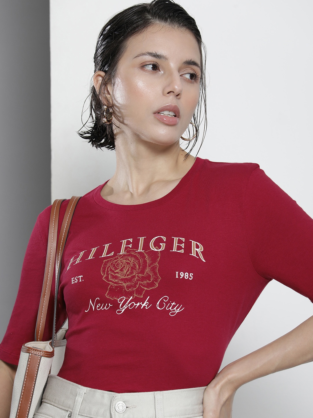 

Tommy Hilfiger Women Maroon Typography Printed Applique Pure Cotton Casual T-shirt