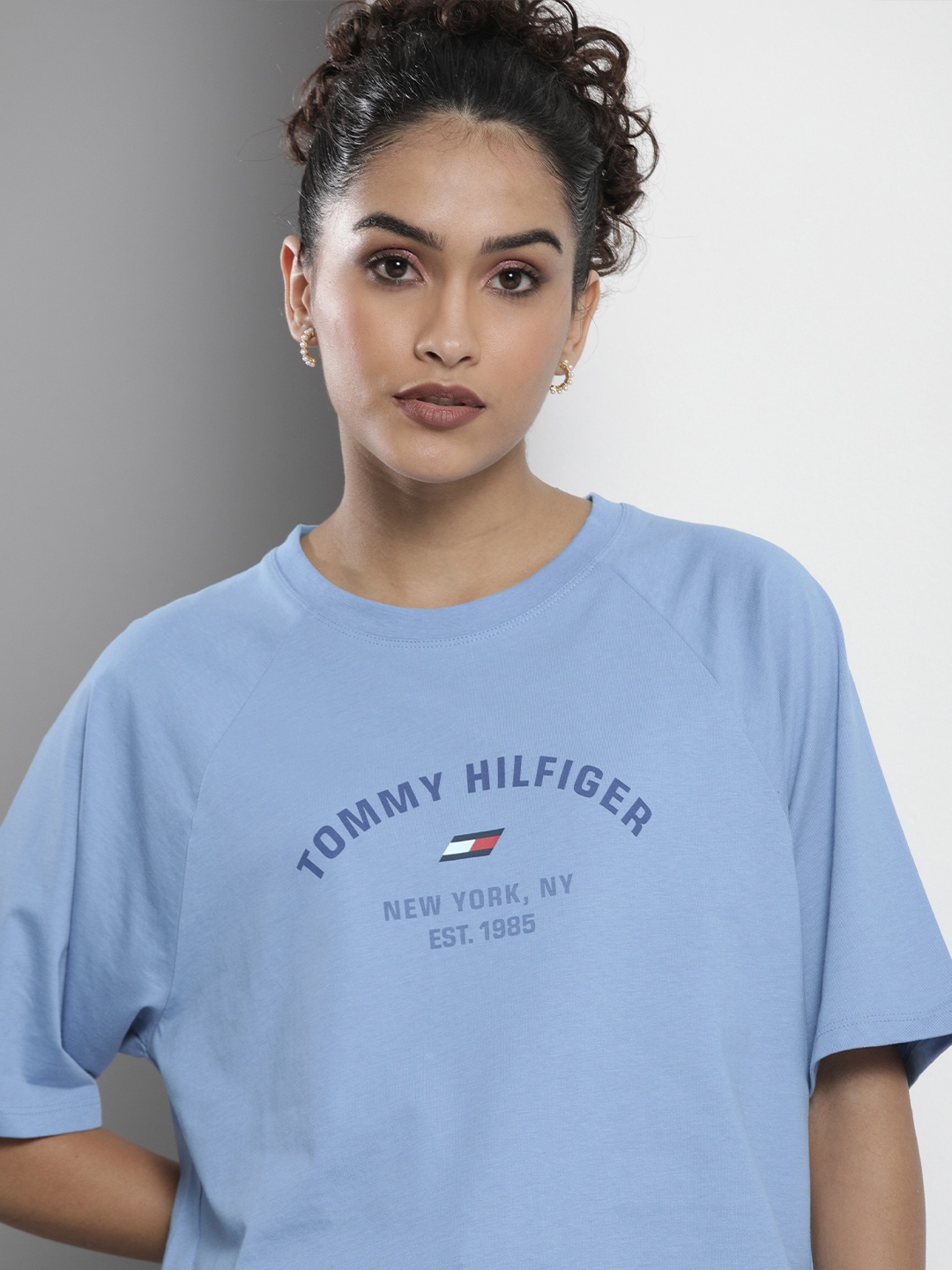 

Tommy Hilfiger Women Blue Typography Printed Relaxed Fit Drop-Shoulder Sleeves T-shirt