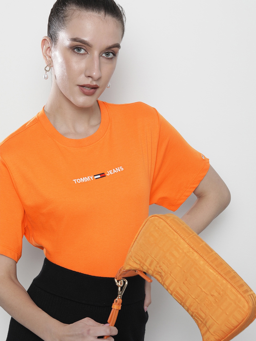 

Tommy Hilfiger Women Orange Solid Embroidered Casual T-shirt