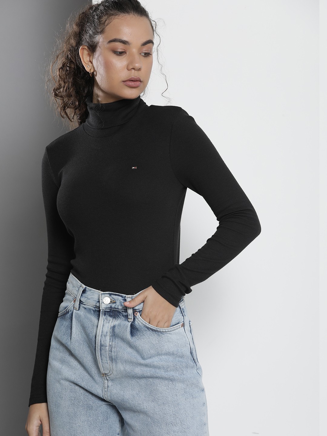 

Tommy Hilfiger Women Black Solid High Neck Slim Fit T-shirt