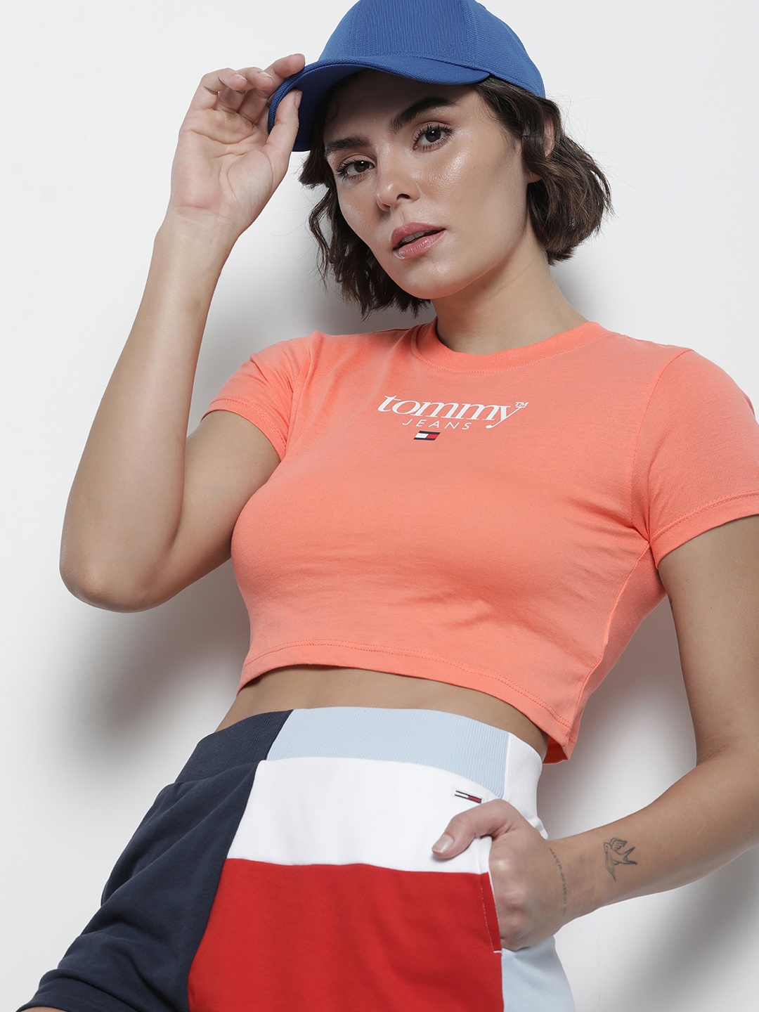 

Tommy Hilfiger Women Peach-Coloured & White Typography Printed Crop T-shirt