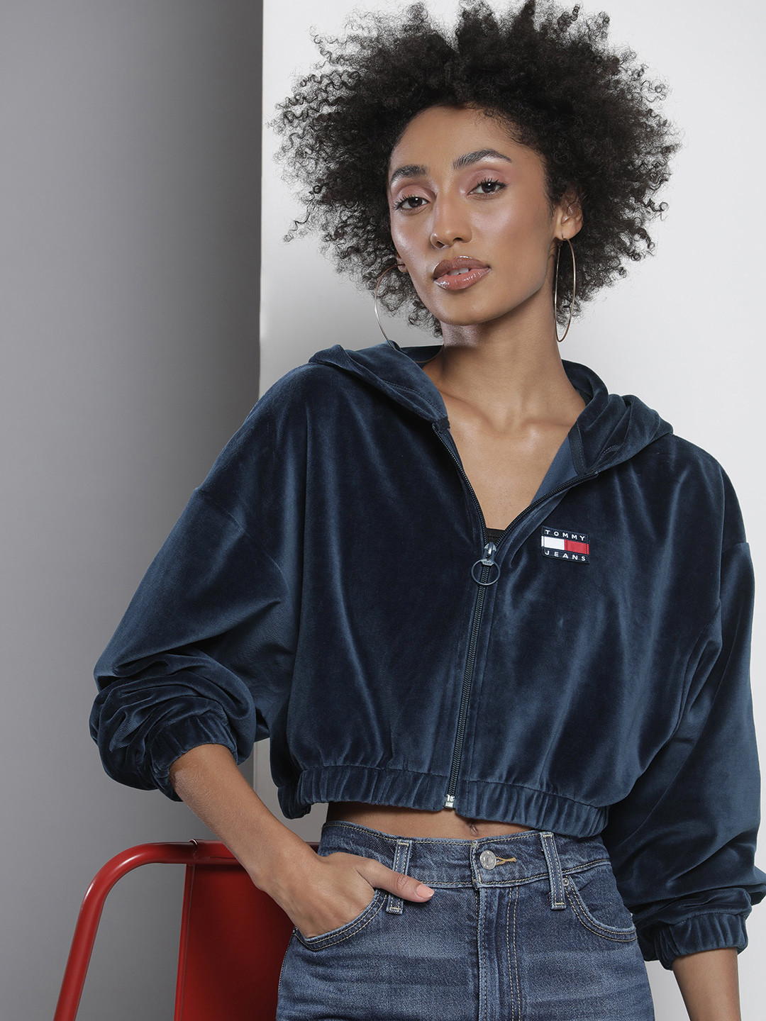 

Tommy Hilfiger Women Blue Solid Cropped Hooded Sweatshirt with Brand Logo Embroidered