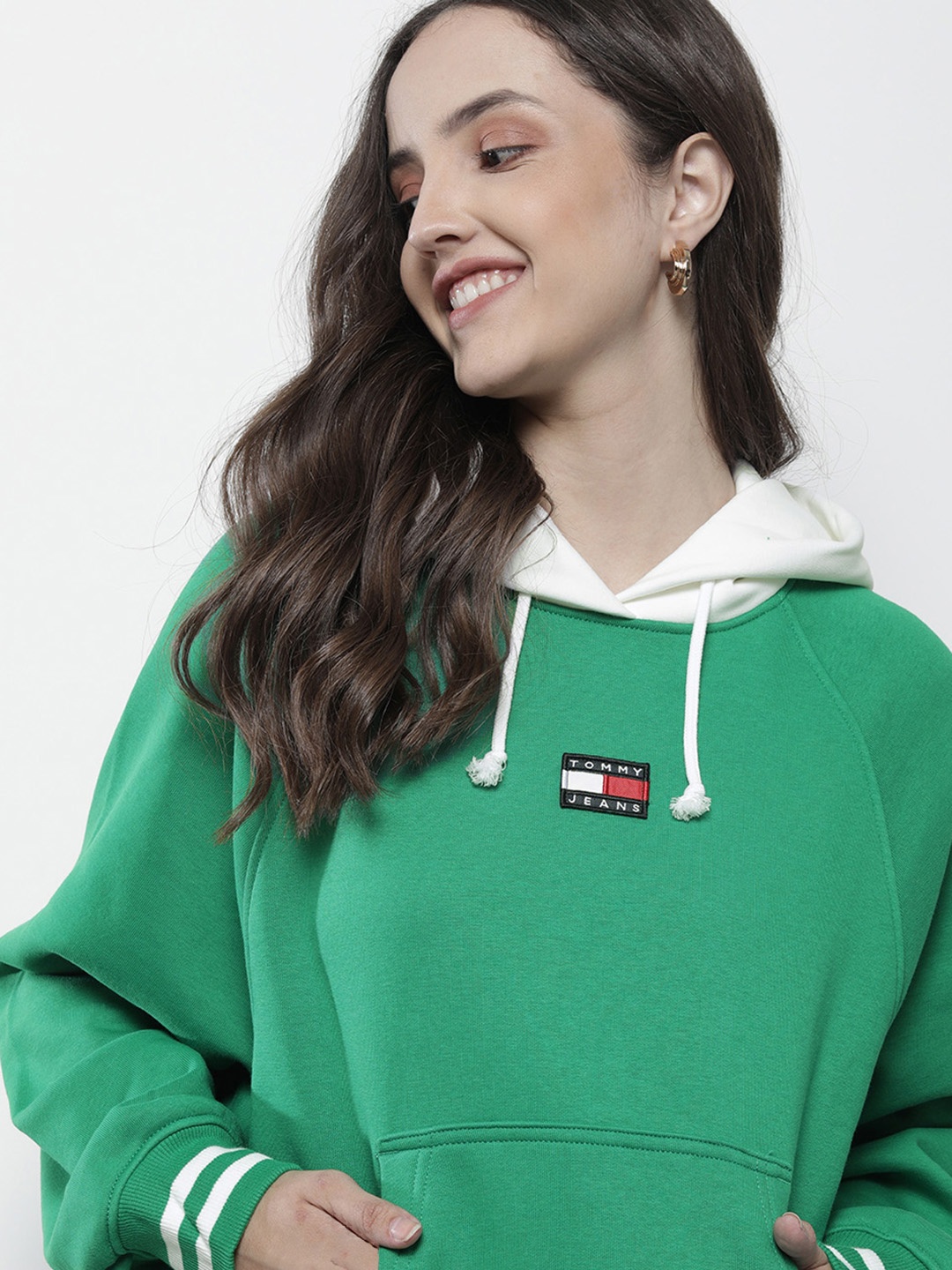 

Tommy Hilfiger Women Green & White Colourblocked Hooded Sweatshirt