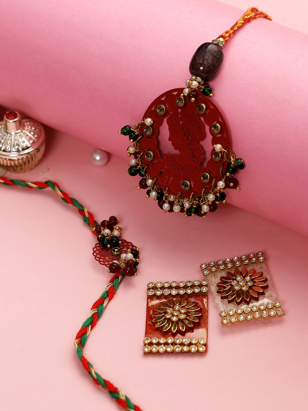 

Aapno Rajasthan Set of 2 Bhaiya Bhabhi Rakhi Set, Red