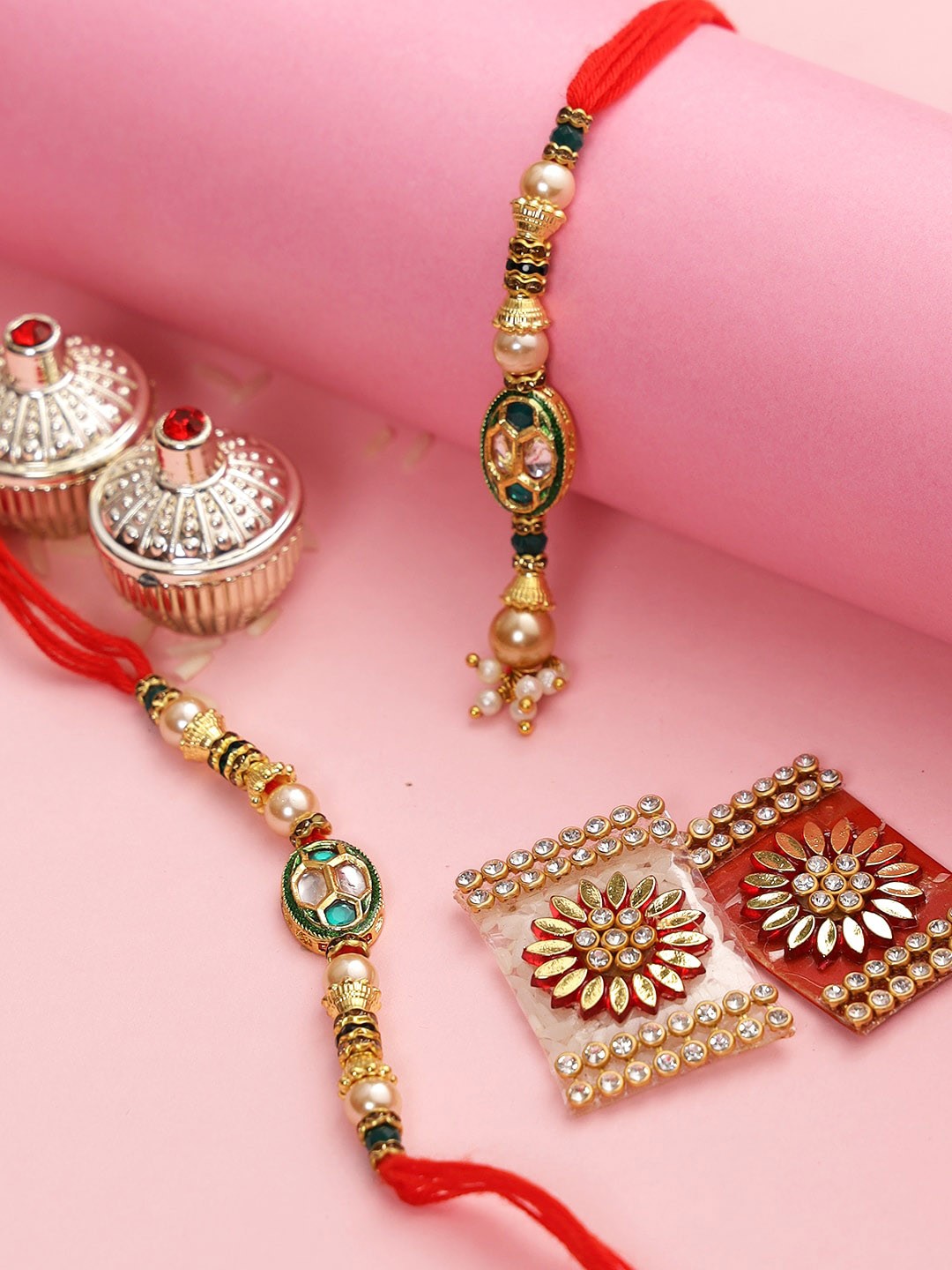 

Aapno Rajasthan Gold Toned Meenakari Bhaiya Bhabhi Rakhi Set