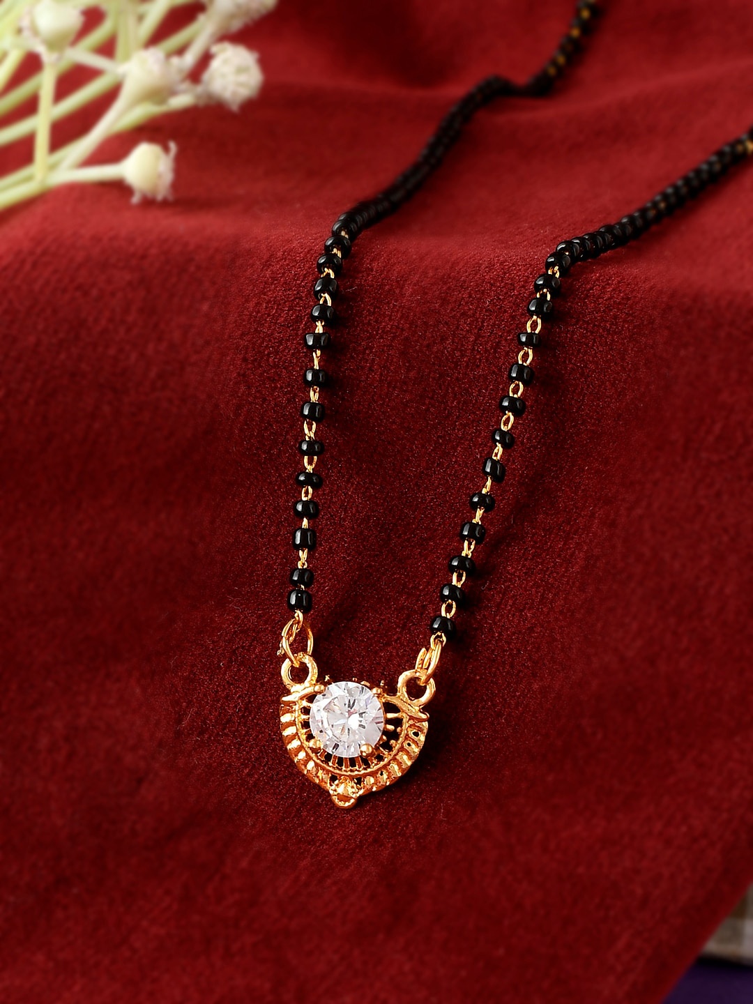 

Silvermerc Designs Women Gold-Plated Black Stone-Studded & Beaded Heart Mangalsutra