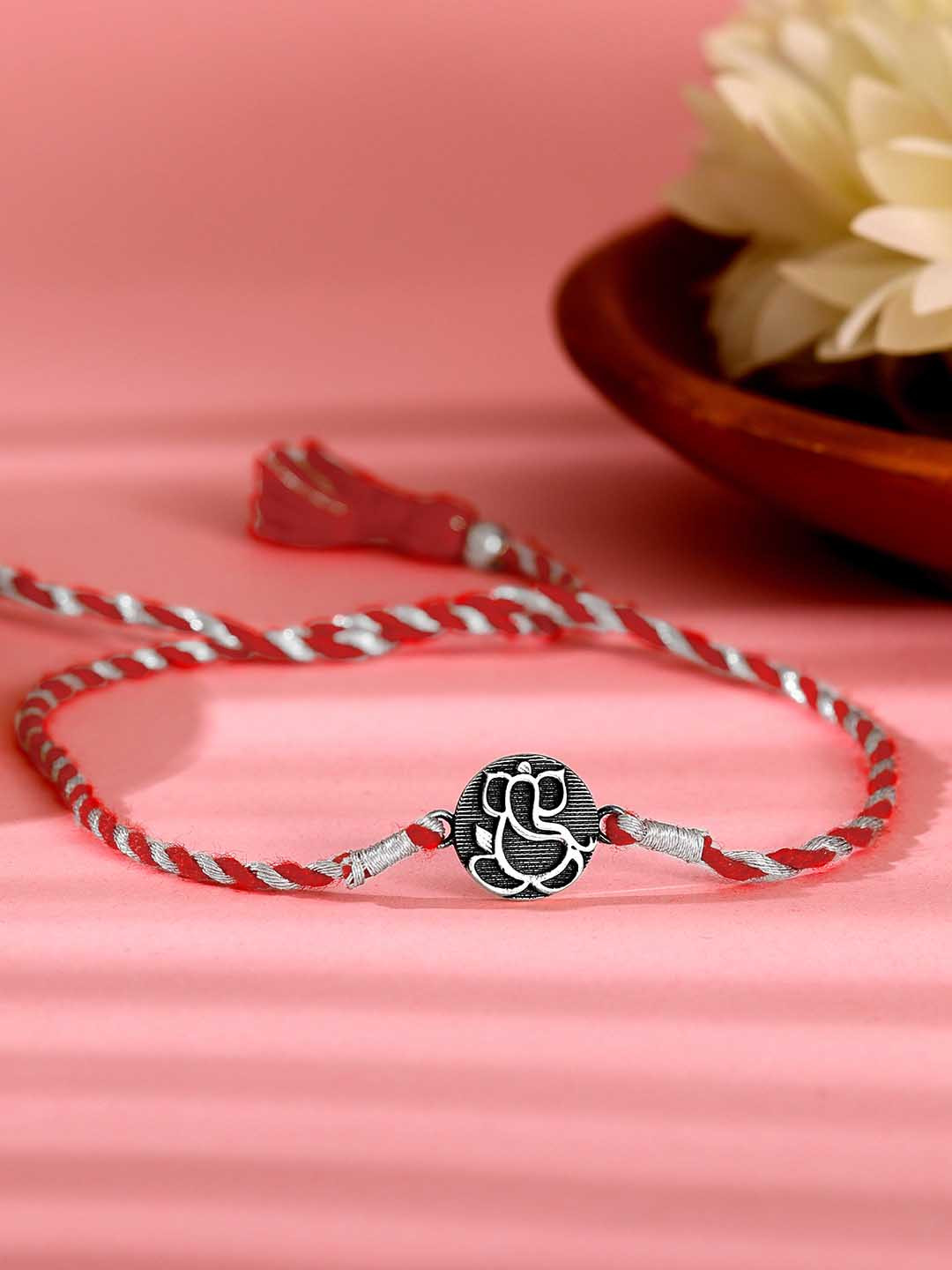 

GIVA 925 Sterling Silver Oxidized Lord Ganesh Rakhi with Roli Chawal