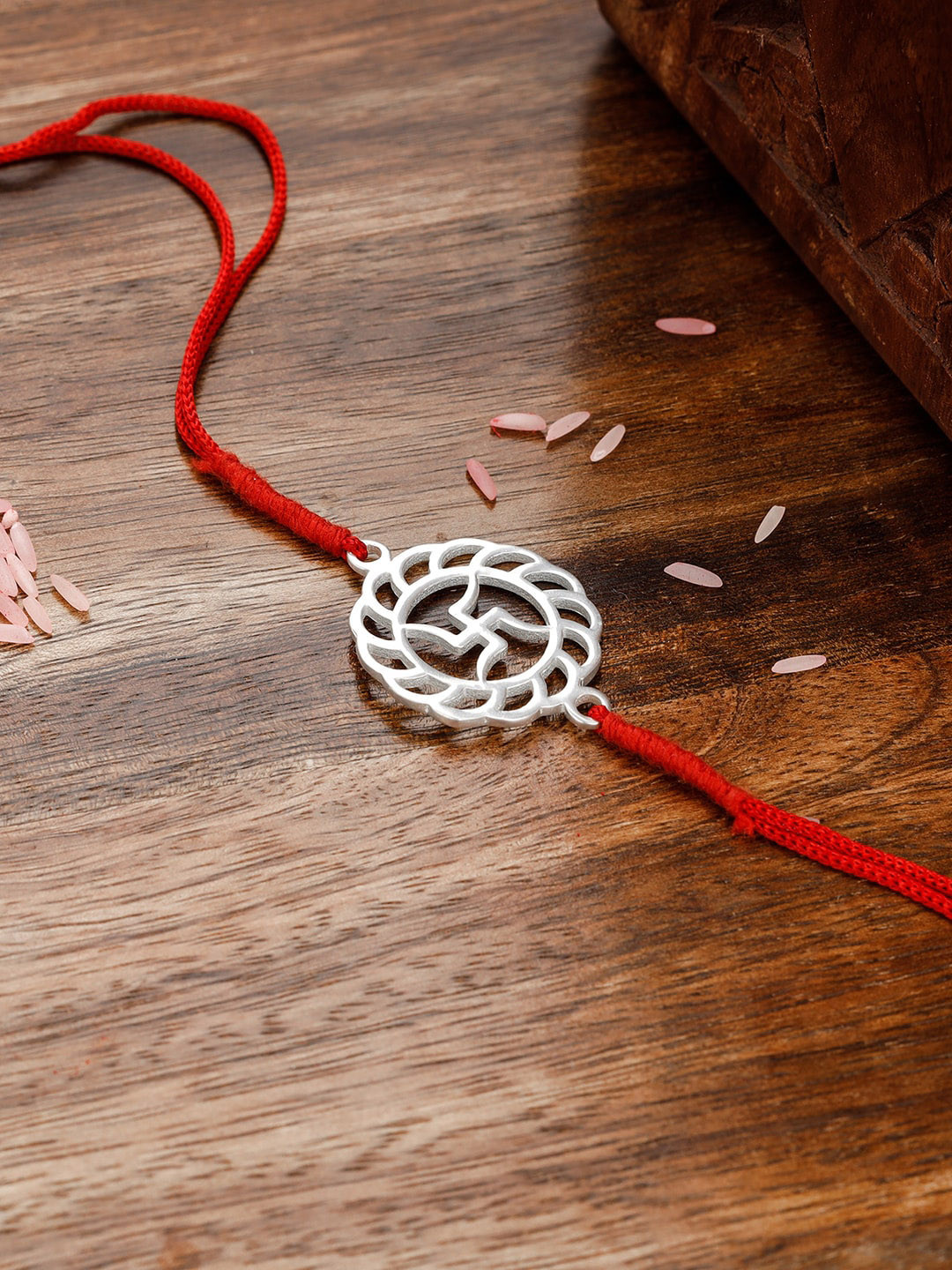 

GIVA 925 Sterling Silver Swastik Rakhi with Roli Chawal