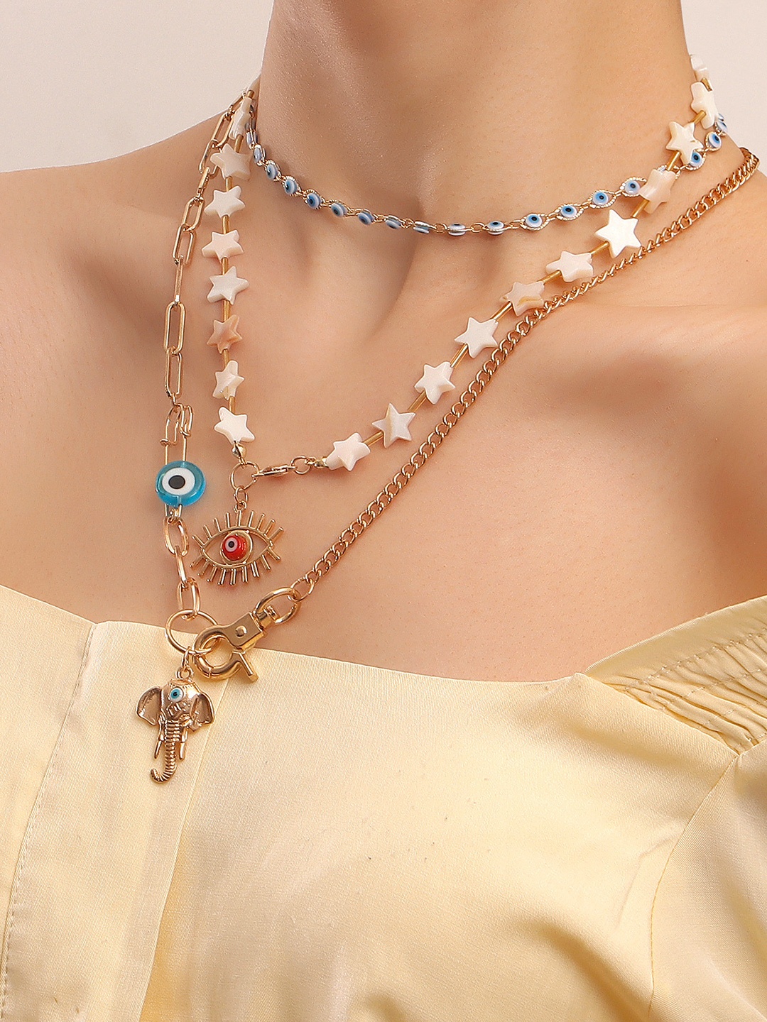 

Yellow Chimes Gold-Plated Layered Chunky With Evil Eye Elephant Star Studded Neckchain