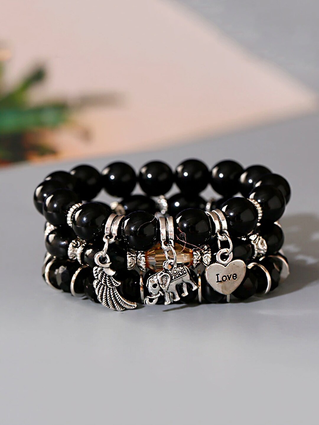 

Yellow Chimes Black Multilayer Bohemian Stretchable Beads Bracelets