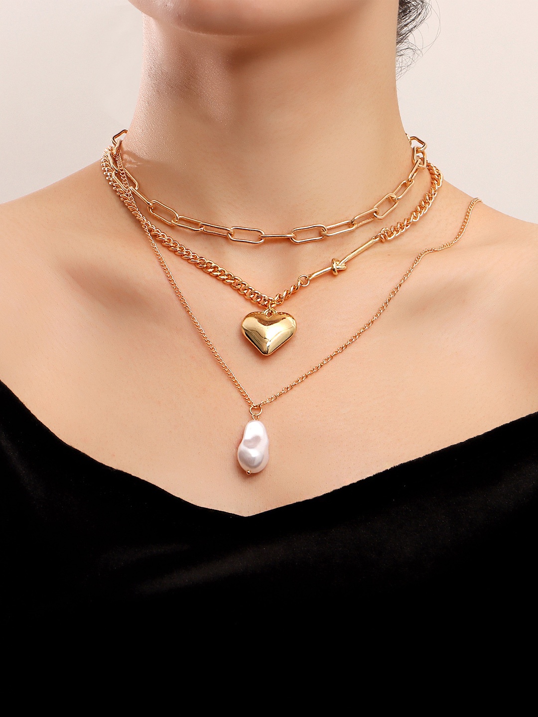 

Yellow Chimes Gold Toned Elegant Heart Shape Layered Pearl Charm Necklace