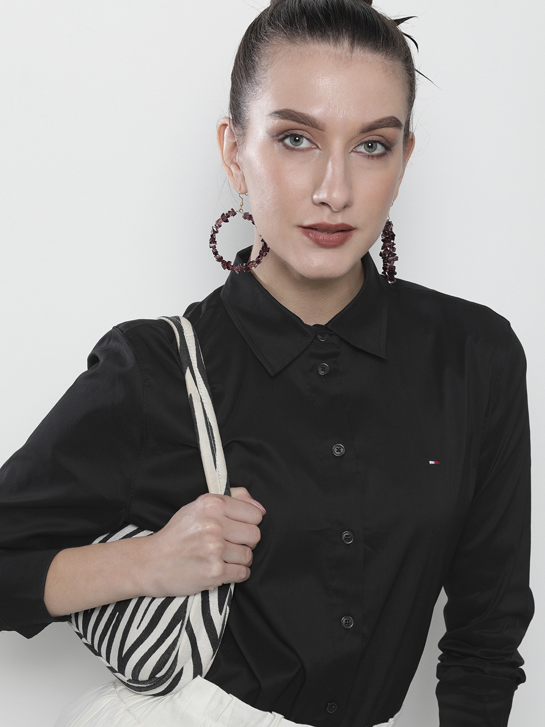 

Tommy Hilfiger Women Black Solid Casual Shirt