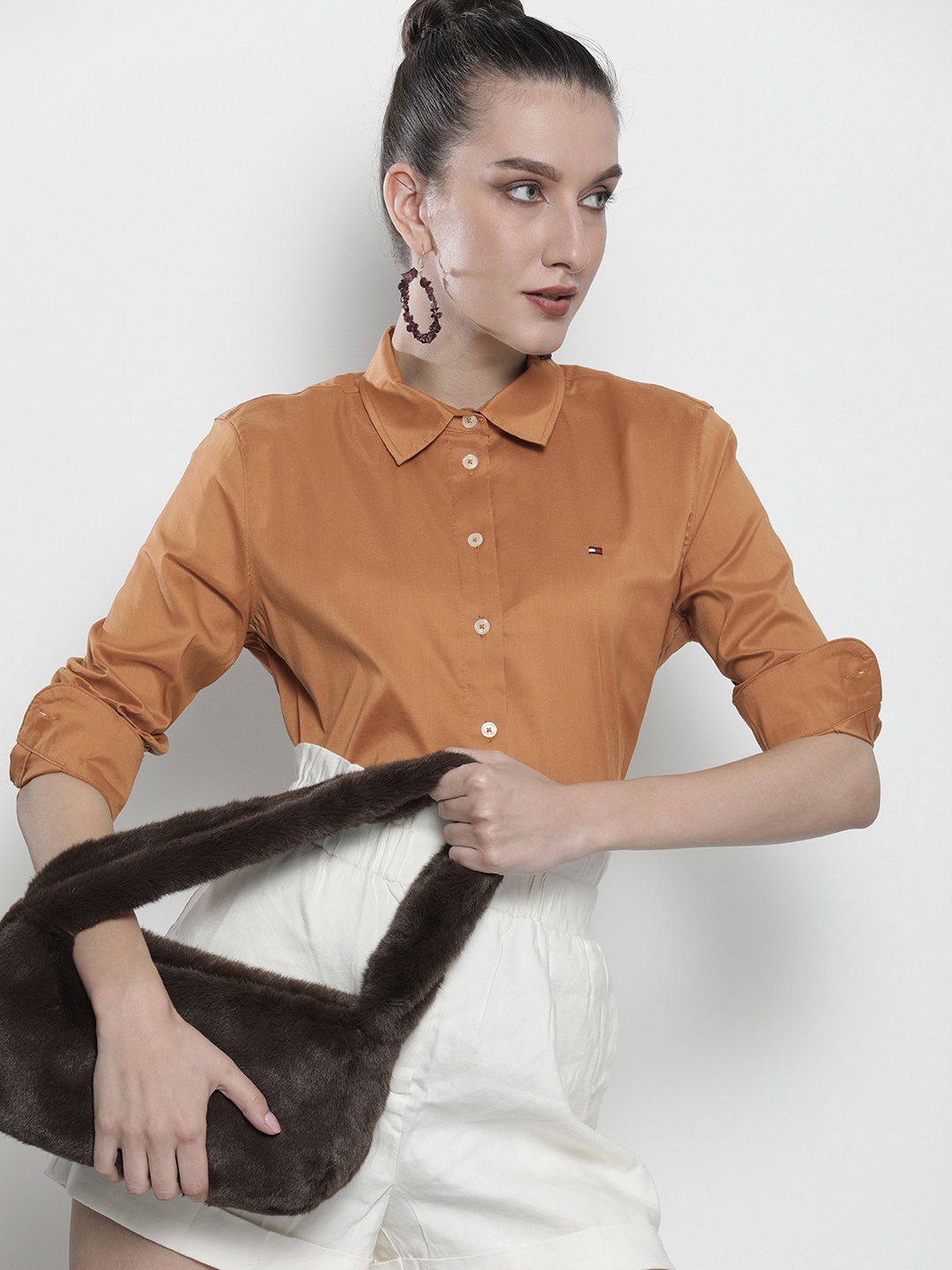 

Tommy Hilfiger Women Beige Solid Casual Shirt
