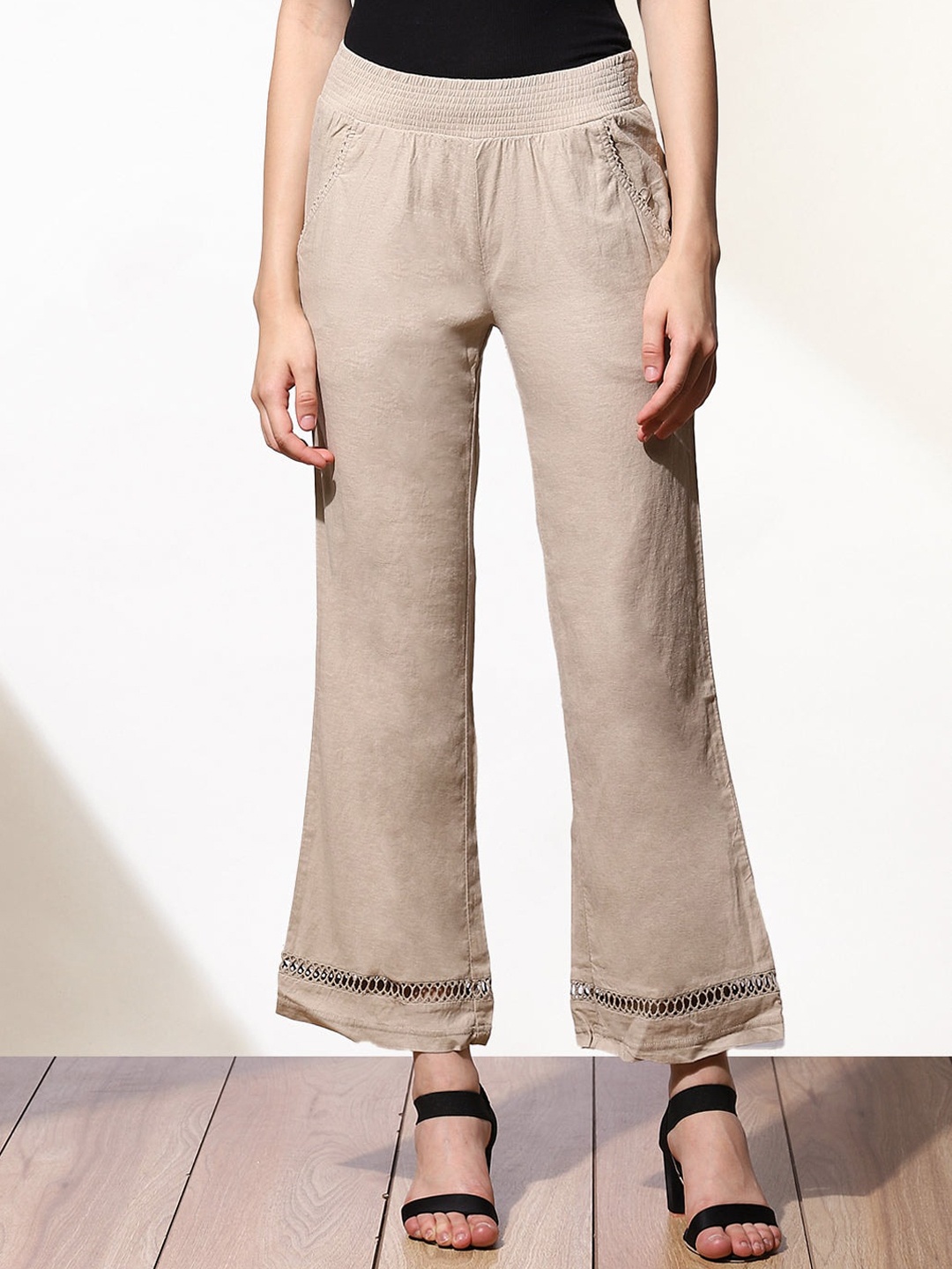 

Lakshita Women Beige Trousers With Bell Hem