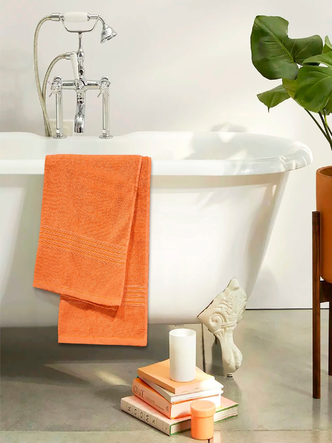 

Divine Casa Orange Solid 550 GSM Cotton Bath Towel