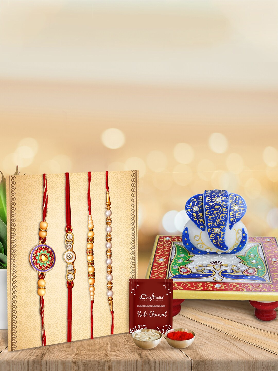 

eCraftIndia Set of 4 Rakhi gifts set comes with a greeting card, Multi