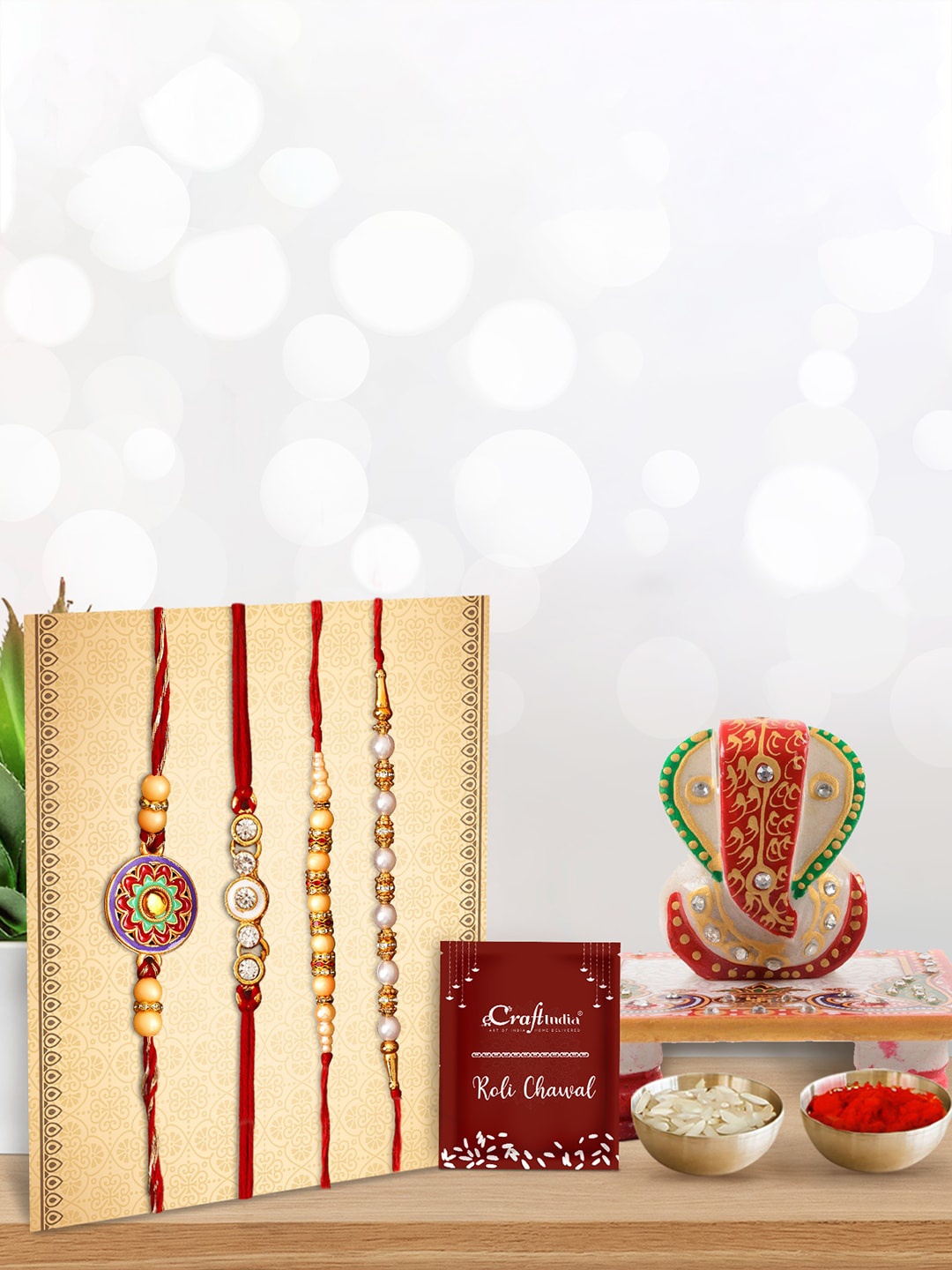 

eCraftIndia Pack of 4 Pearl Rakhis with Lord Ganesha Chowki, Gold