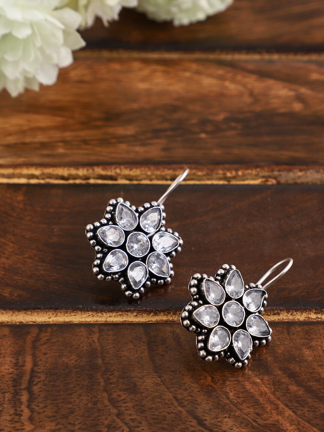 

VENI White & Silver-Plated Oxidised Floral AD Studded Drop Earrings