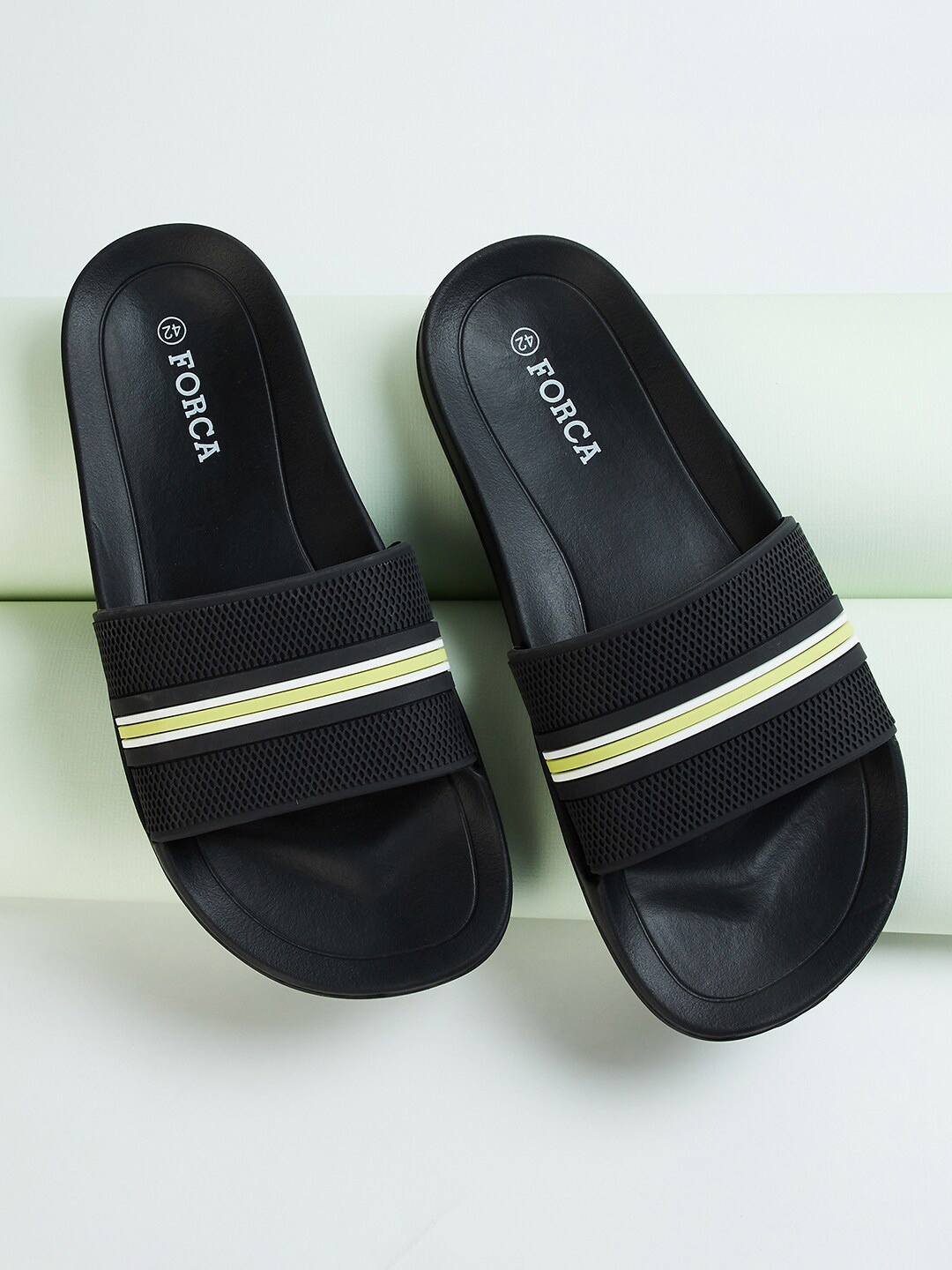 

Forca by Lifestyle Men Black & White Striped Rubber Sliders
