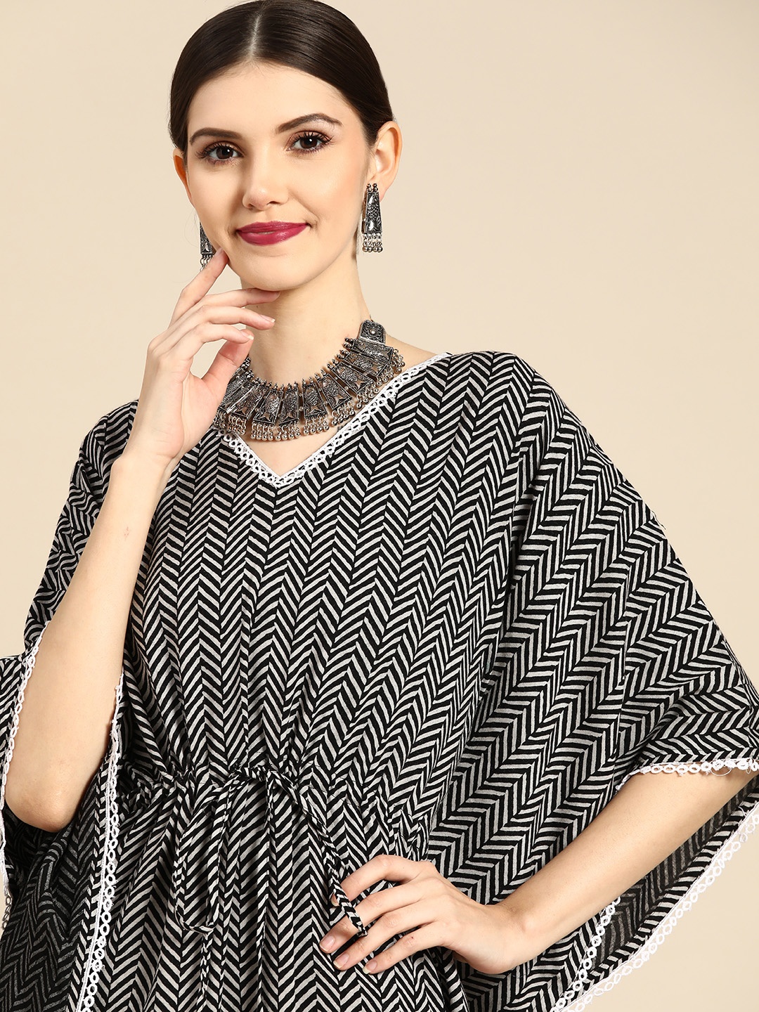 

Anouk Women Black Printed Flared Sleeves Kaftan Kurta