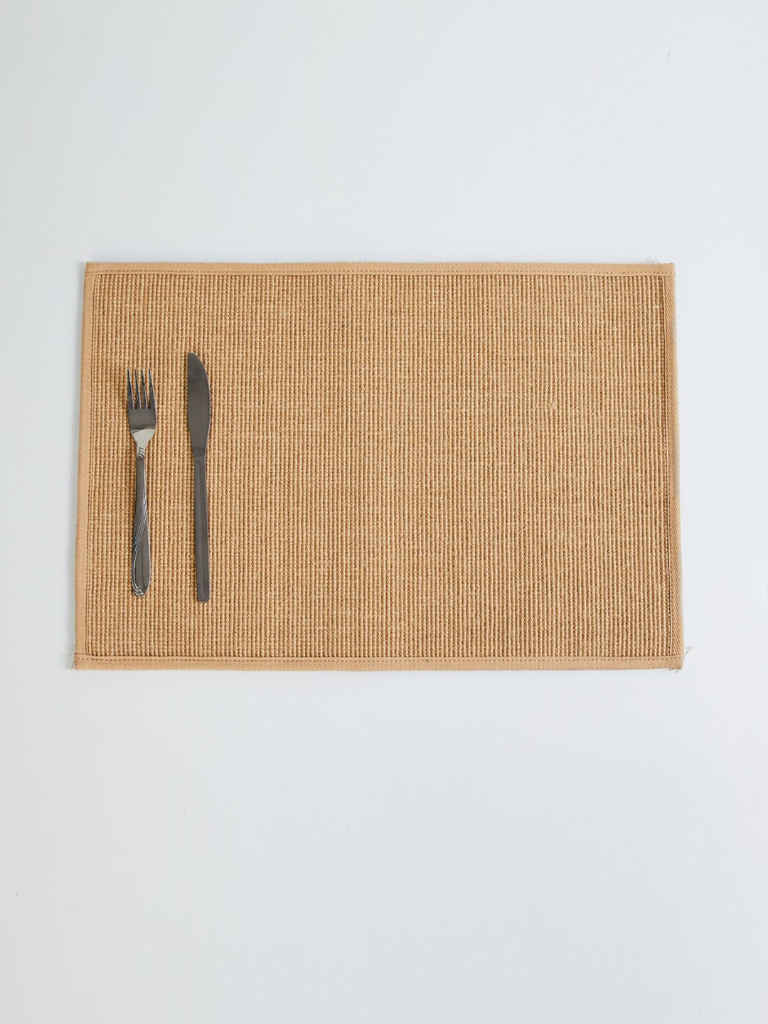 

Home Centre Brown Textured Rectangle Jute Table Placemat