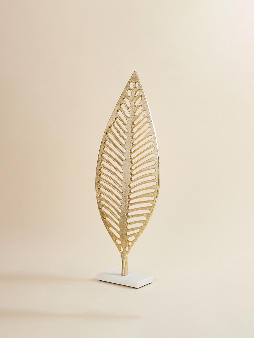 

Home Centre Gold-Toned Textured Leaf Sculpture Showpiece